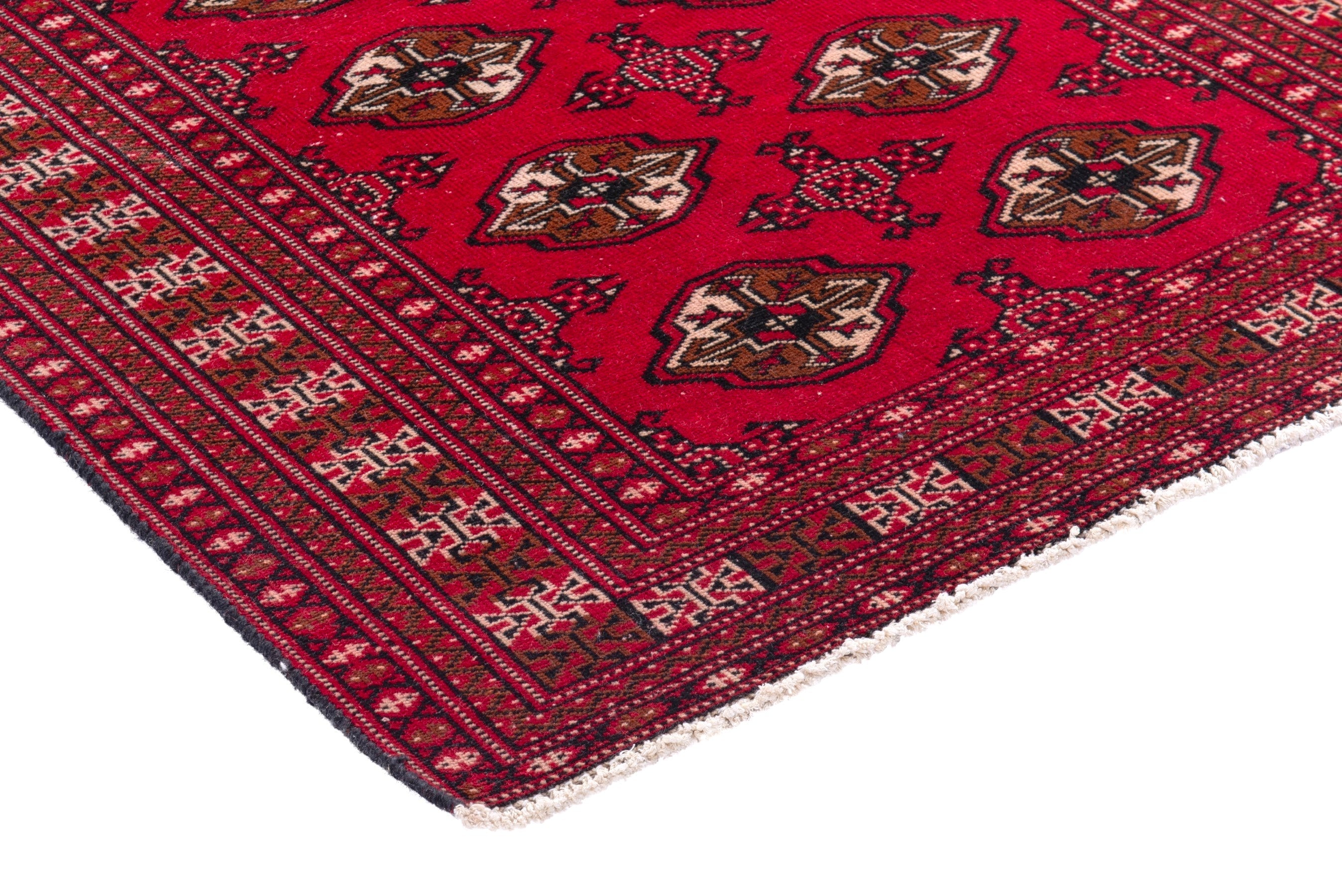 Persian Torkaman accent rug in deep red and tan, view 4 of 17