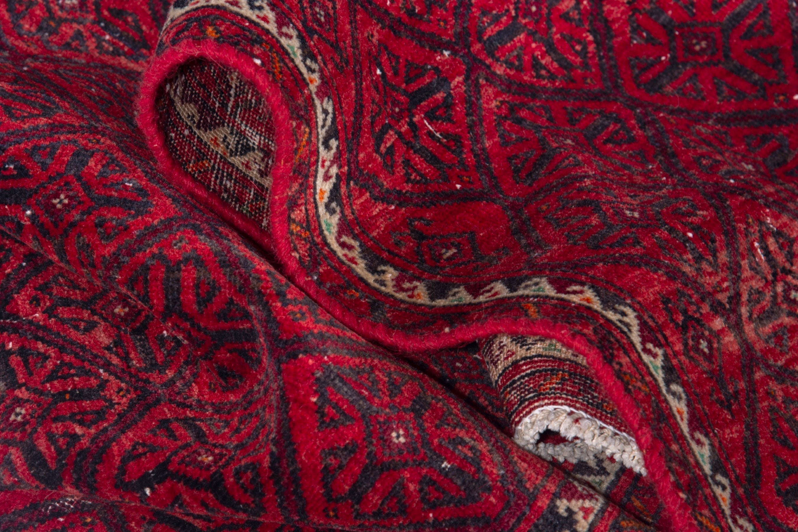 Persian Baluch accent rug in deep red and burgundy, view 14 of 17