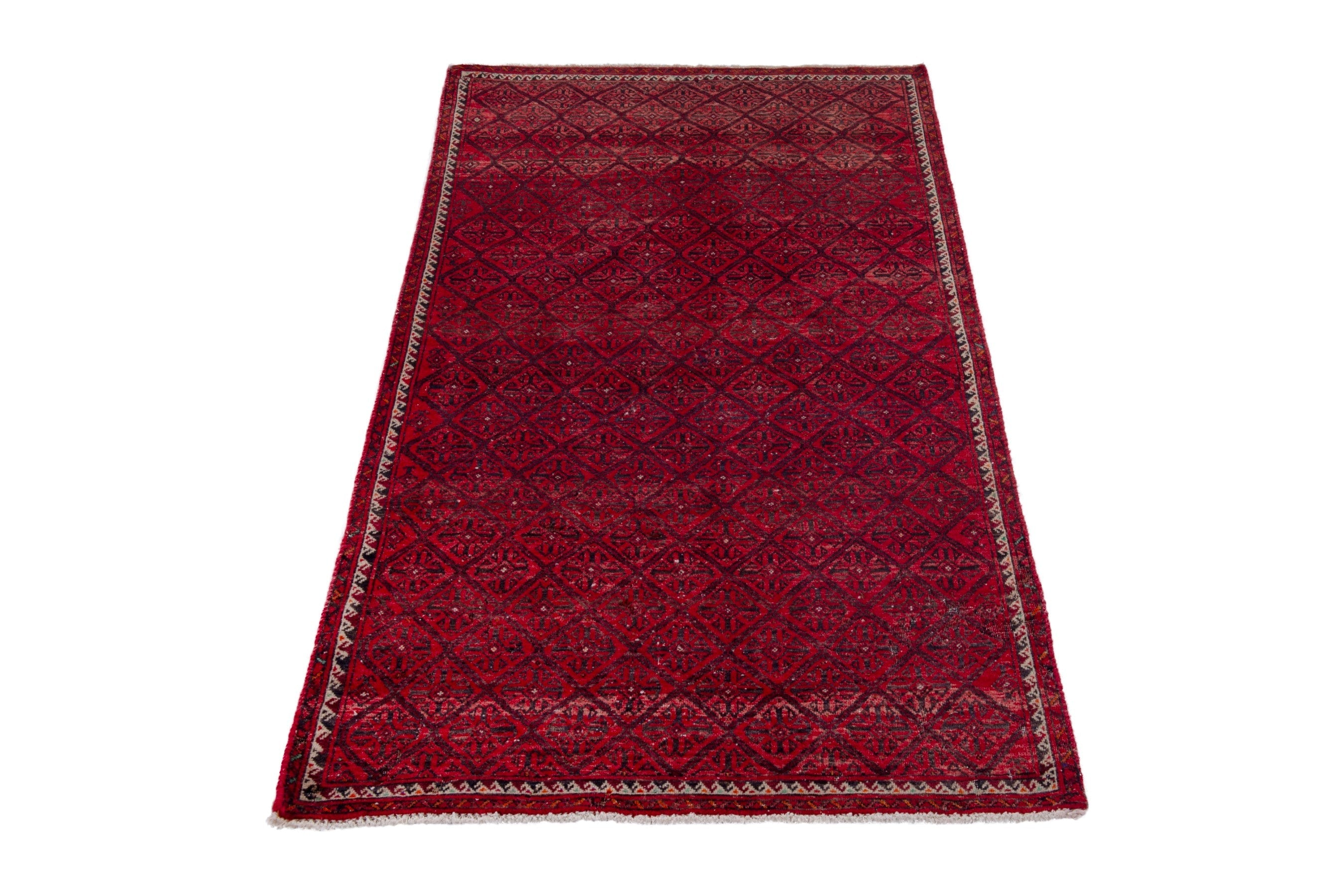 Persian Baluch accent rug in deep red and burgundy, view 2 of 17