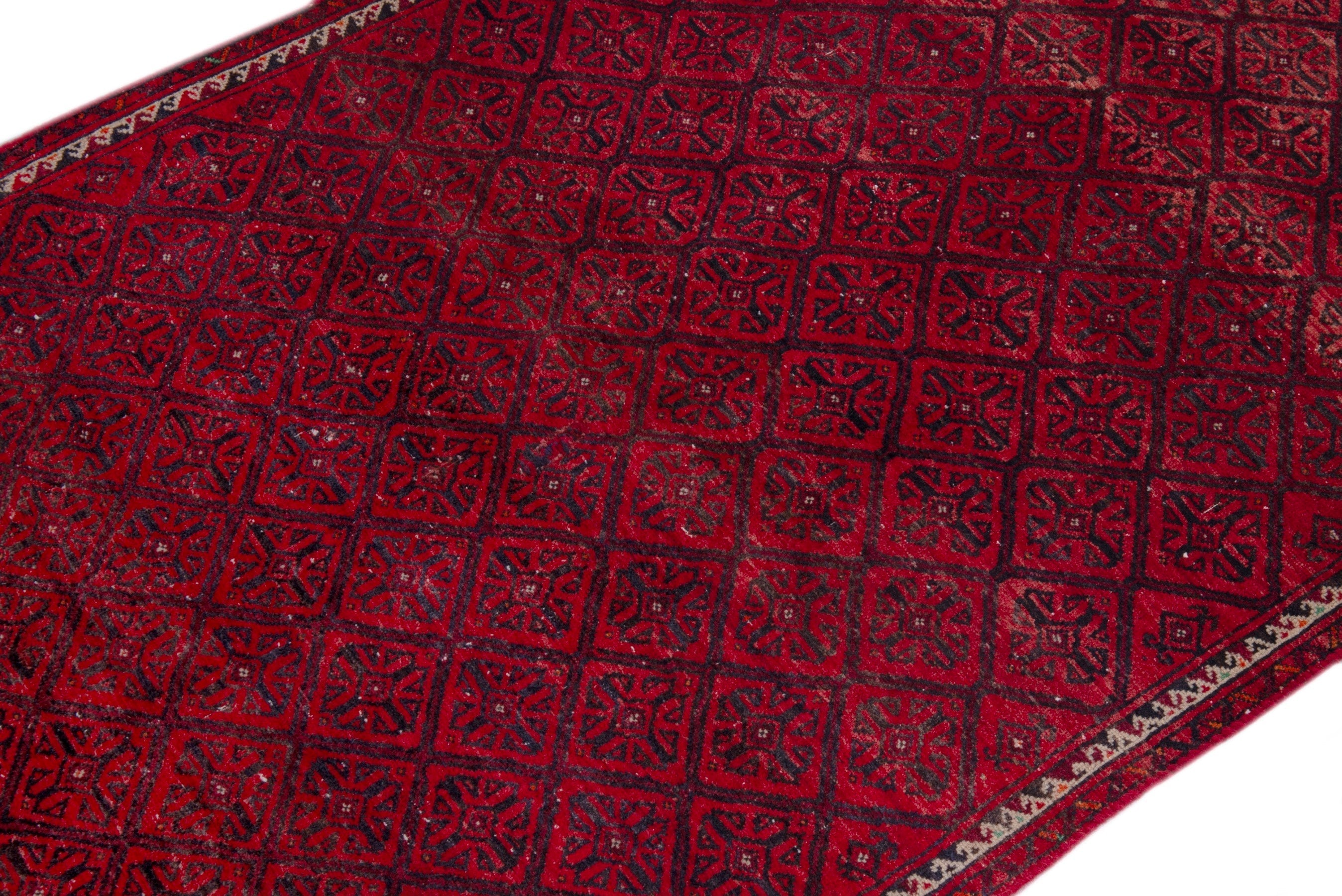 Persian Baluch accent rug in deep red and burgundy, view 6 of 17
