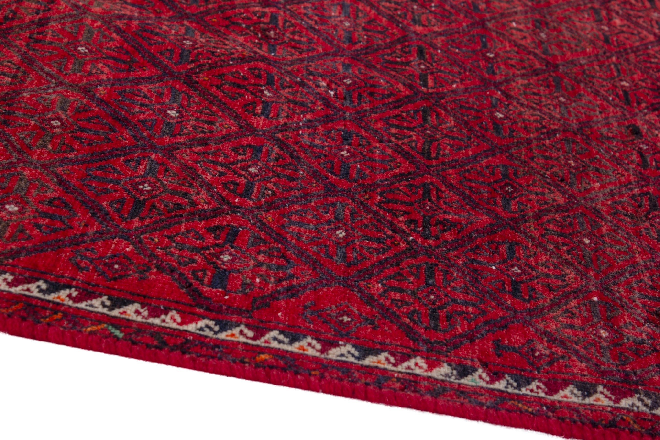 Persian Baluch accent rug in deep red and burgundy, view 8 of 17