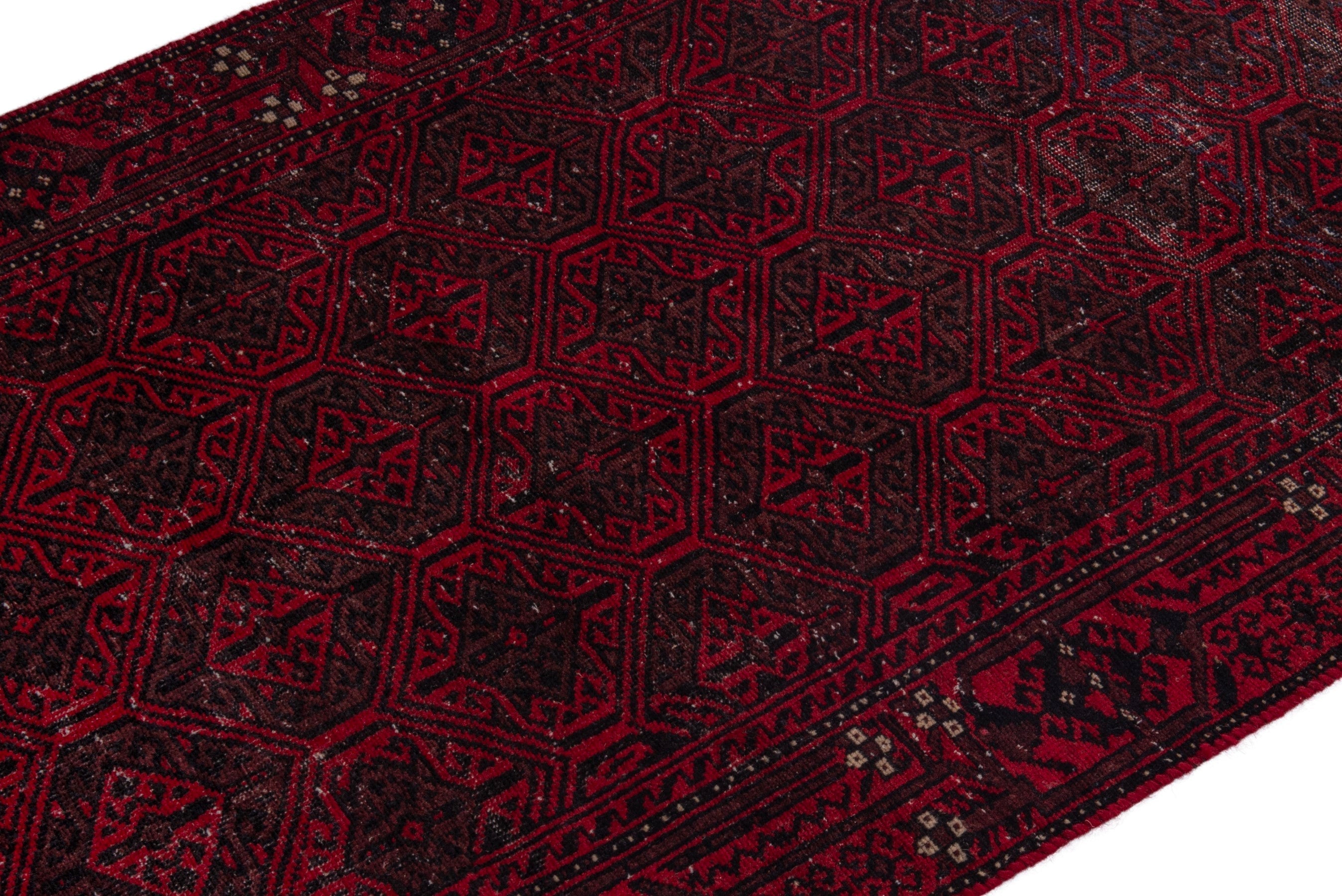 Persian Baluch runner rug in burgundy and deep red, view 6 of 18