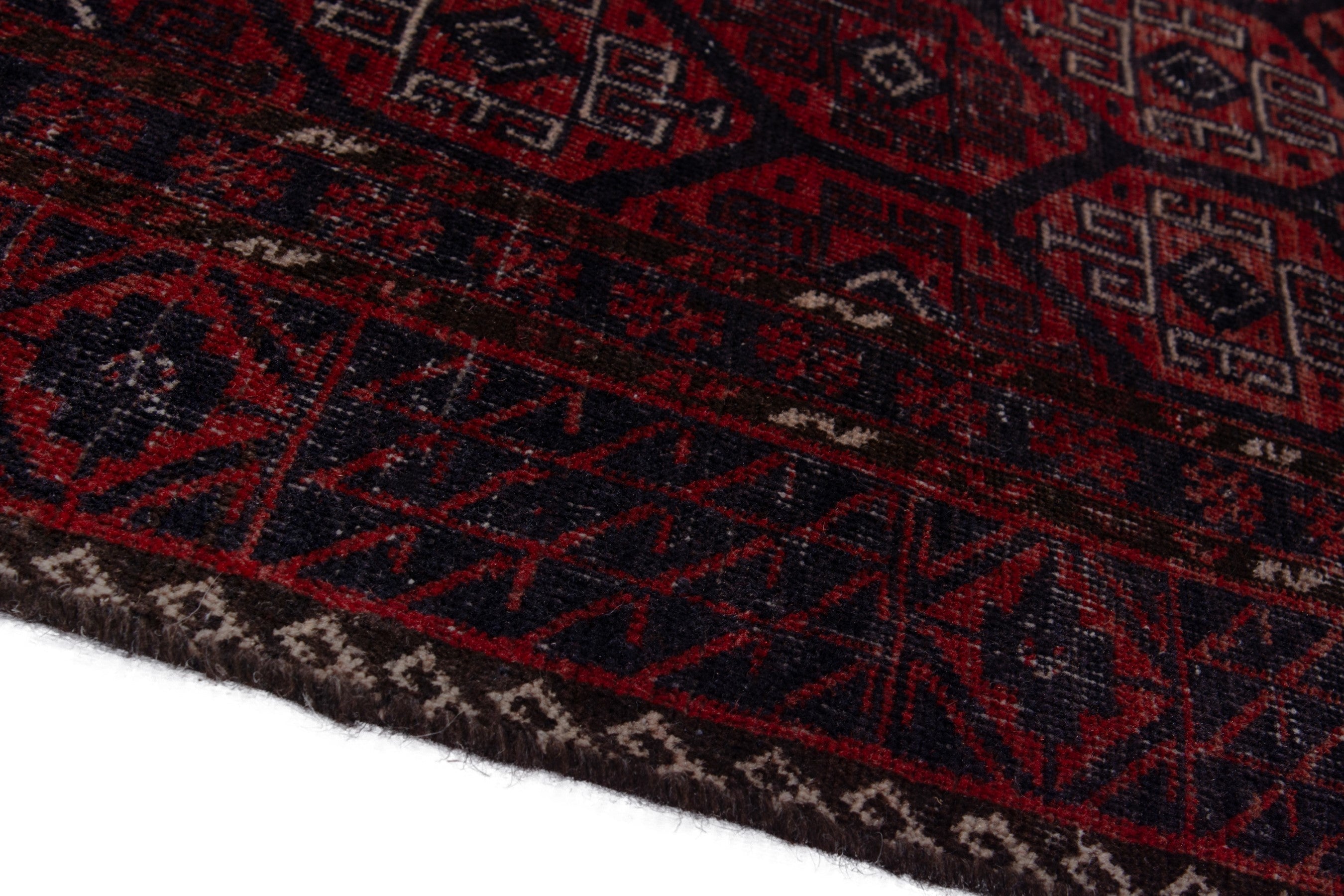 Persian Baluch runner rug in burgundy and faded red, view 8 of 16