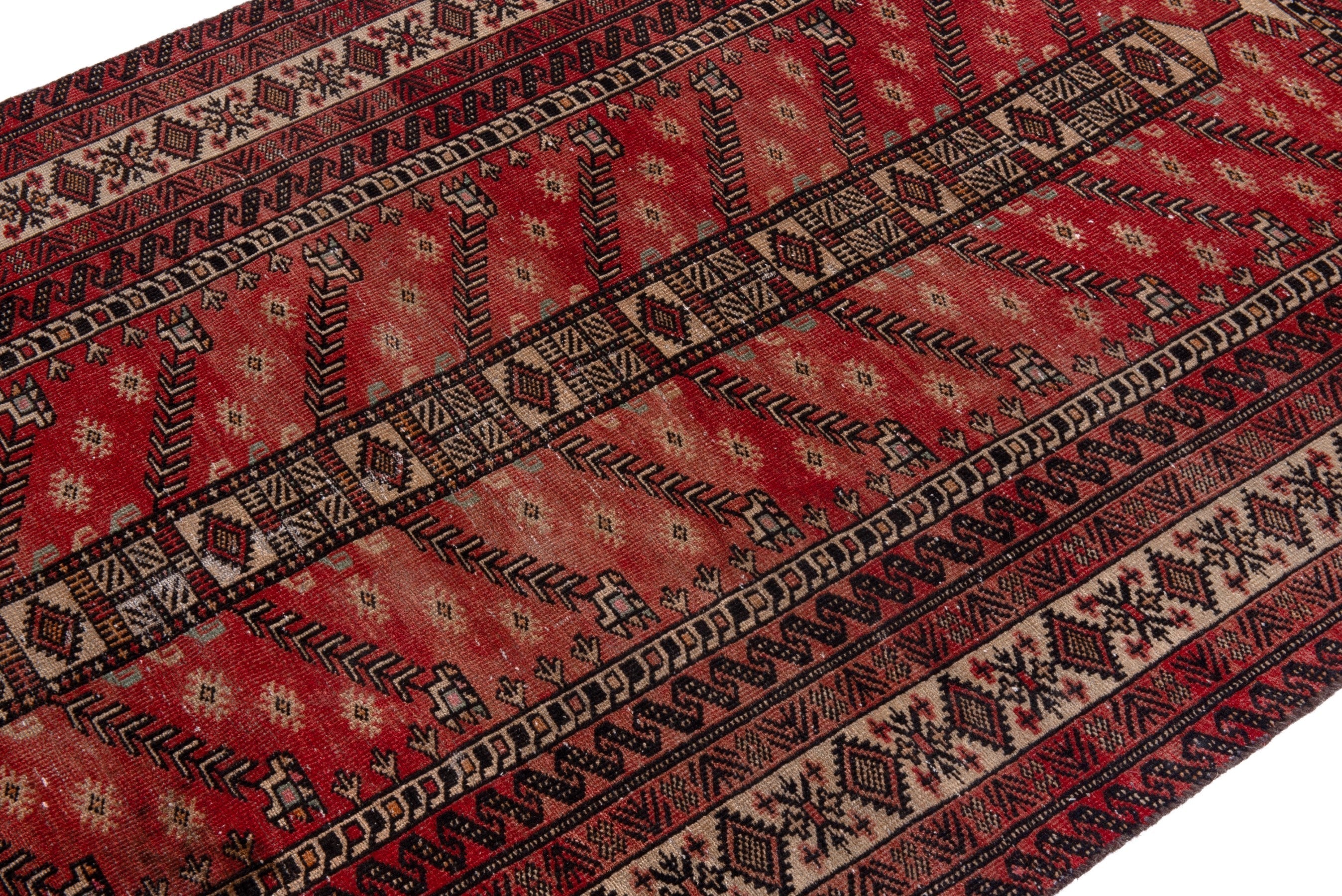 Persian Baluch area rug in deep red and cream, view 6 of 17