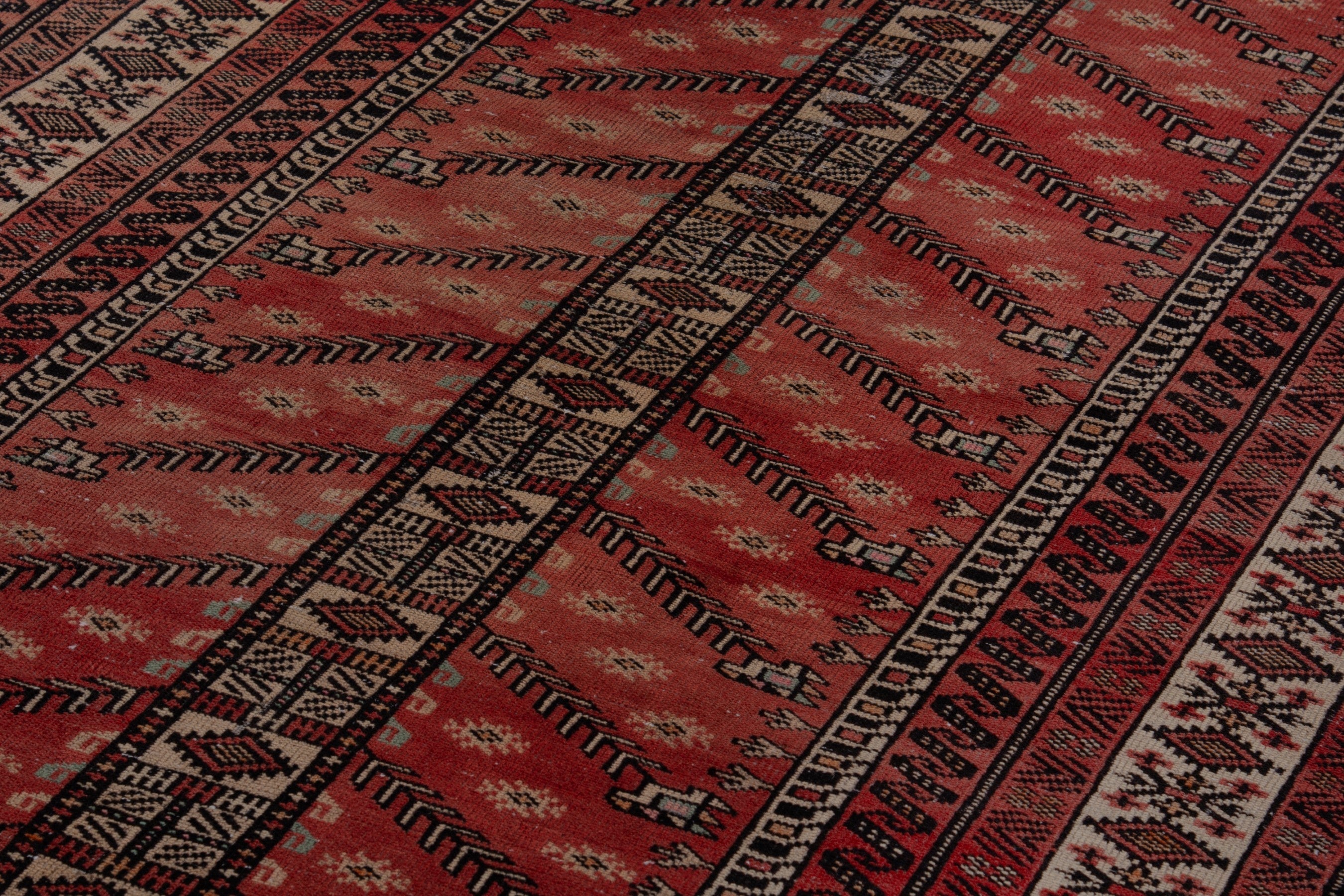 Persian Baluch area rug in deep red and cream, view 9 of 17