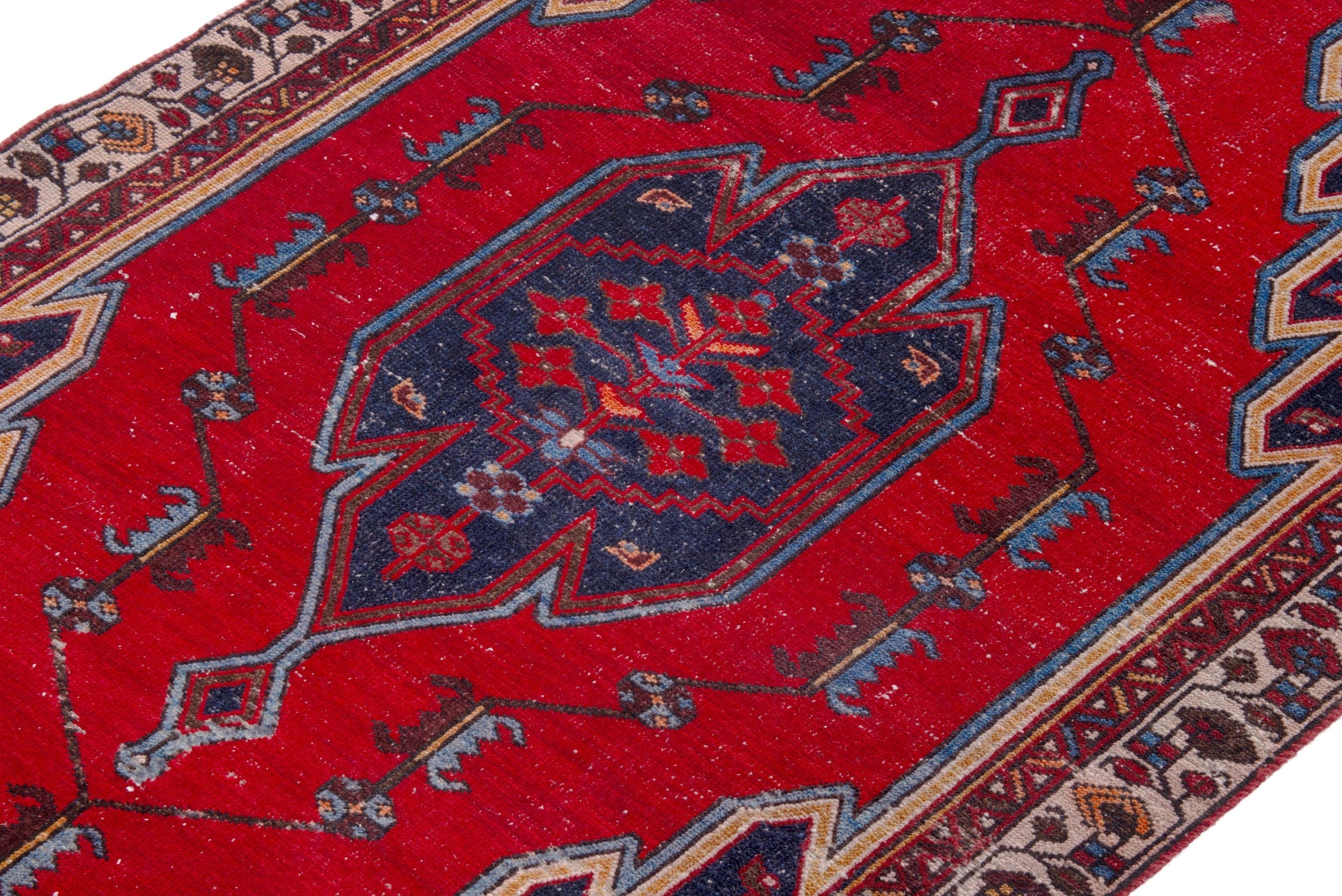 Persian Saveh accent rug in deep red and dark blue, view 6 of 22