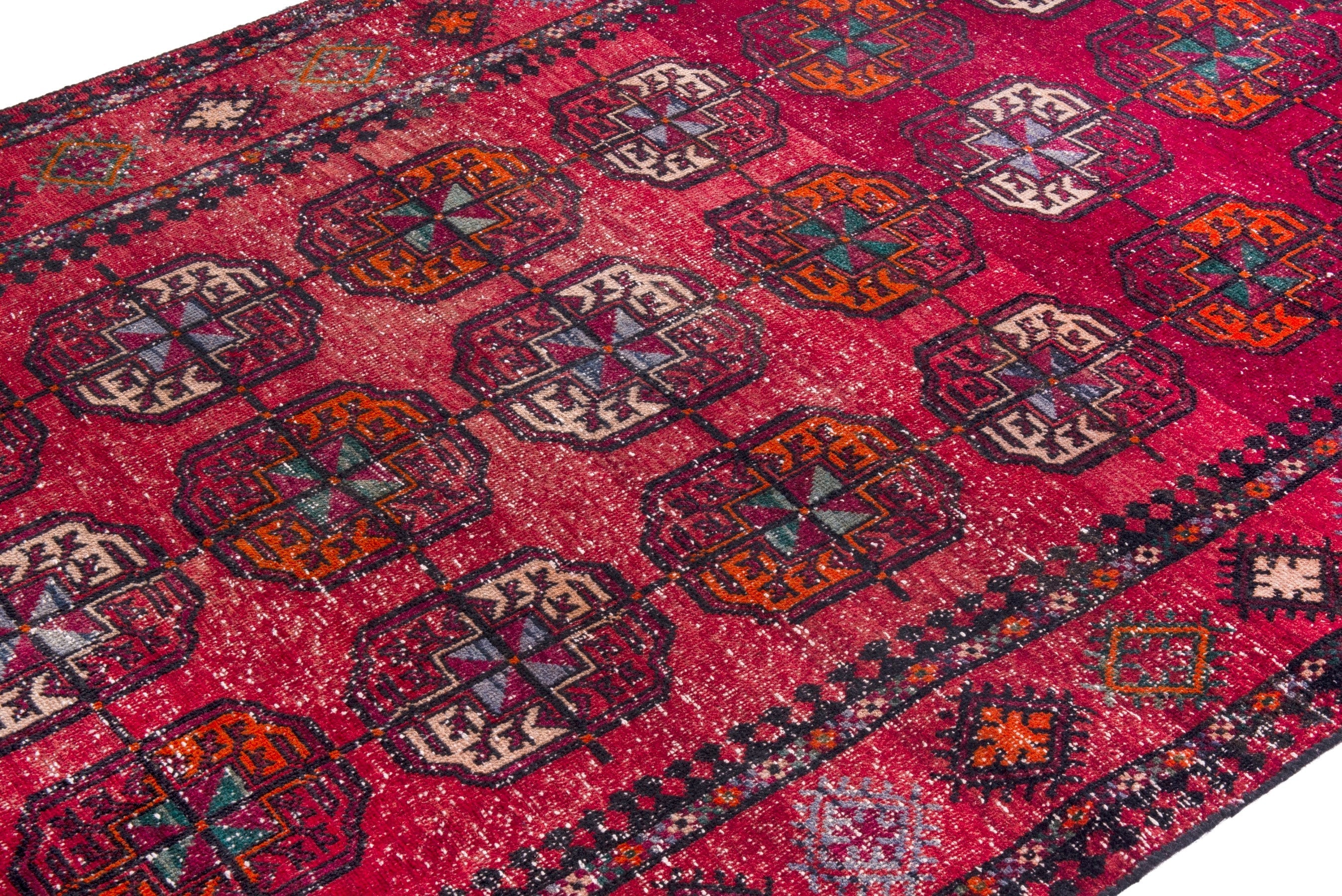 Persian Ghoochan area rug in deep red and faded red, view 6 of 19