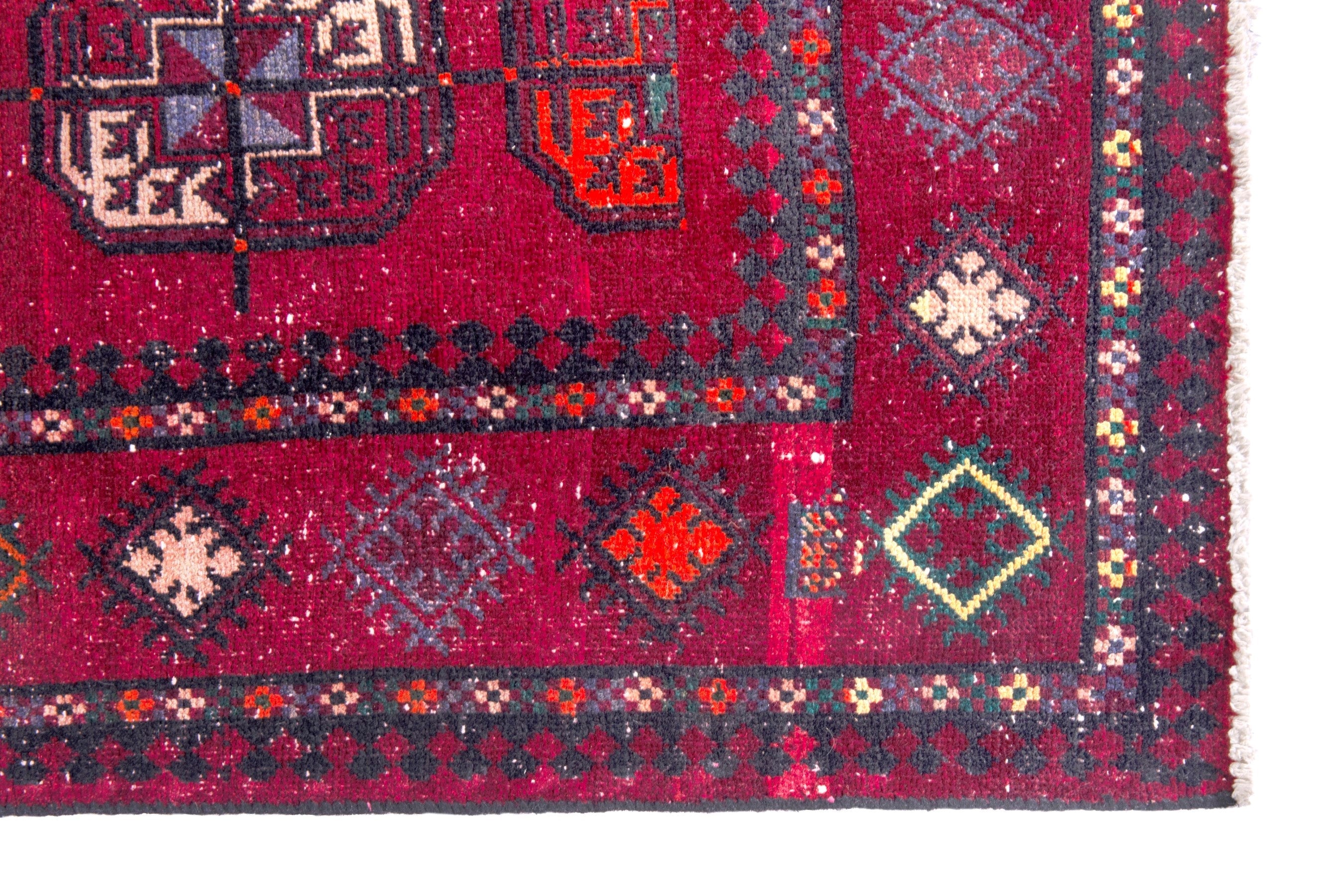 Persian Ghoochan area rug in deep red and faded red, view 5 of 19