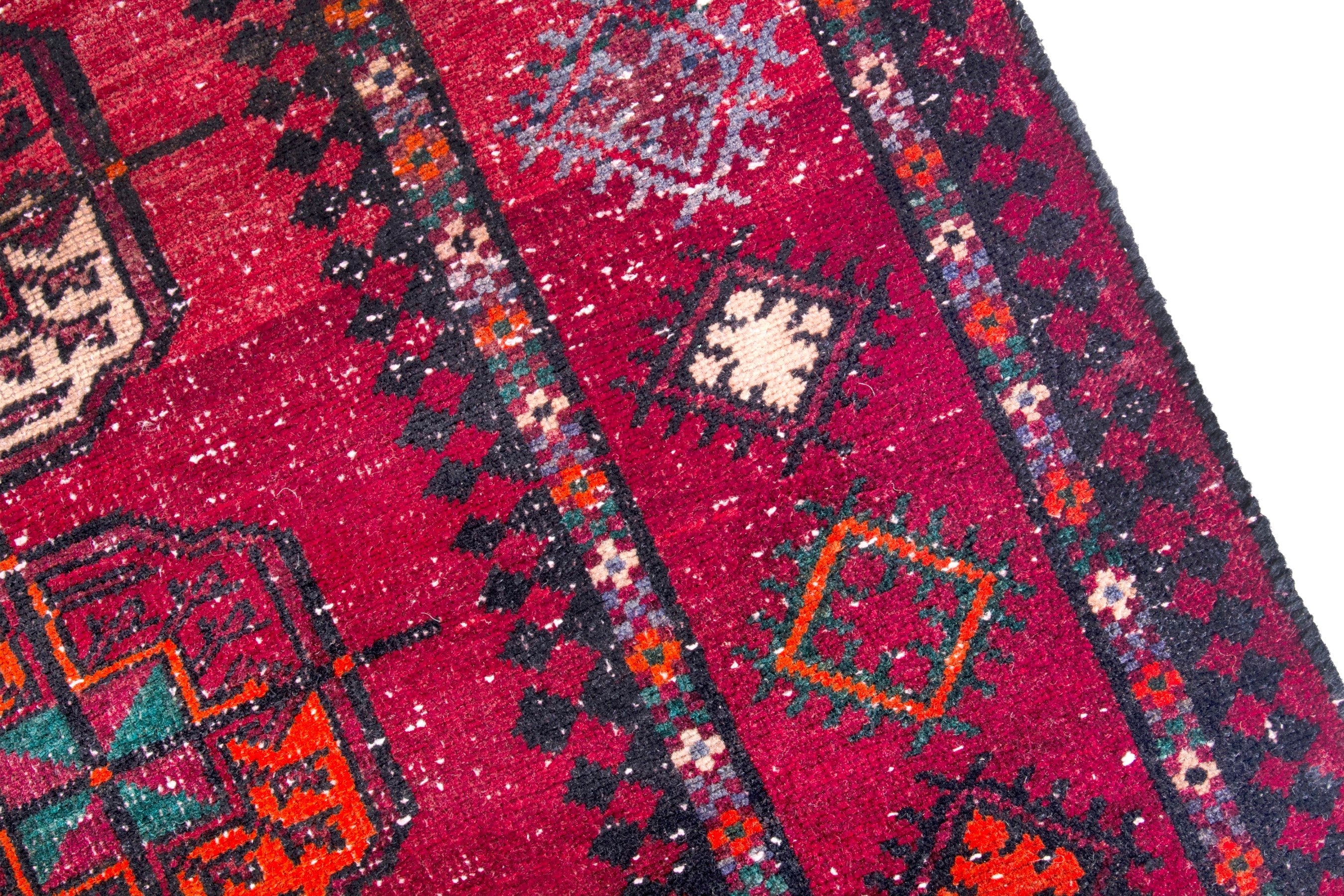 Persian Ghoochan area rug in deep red and faded red, view 7 of 19