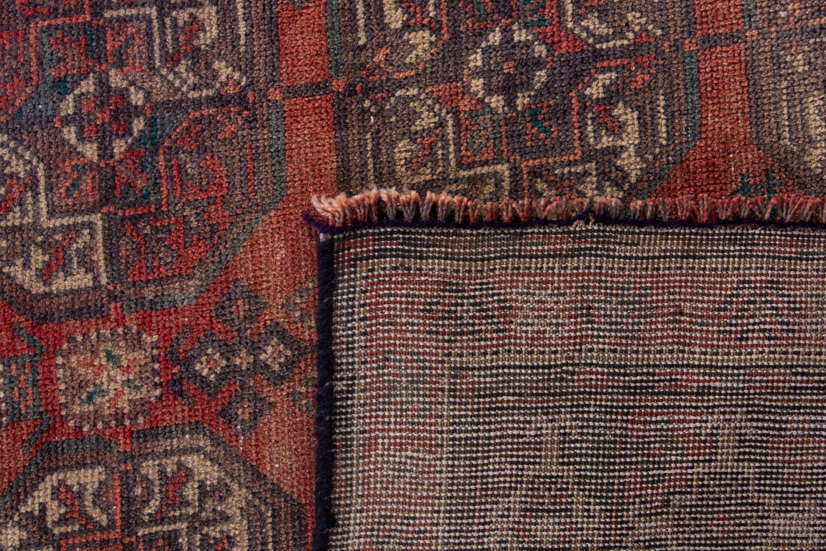 Persian Baluch runner rug in deep red and ochre, view 17 of 17
