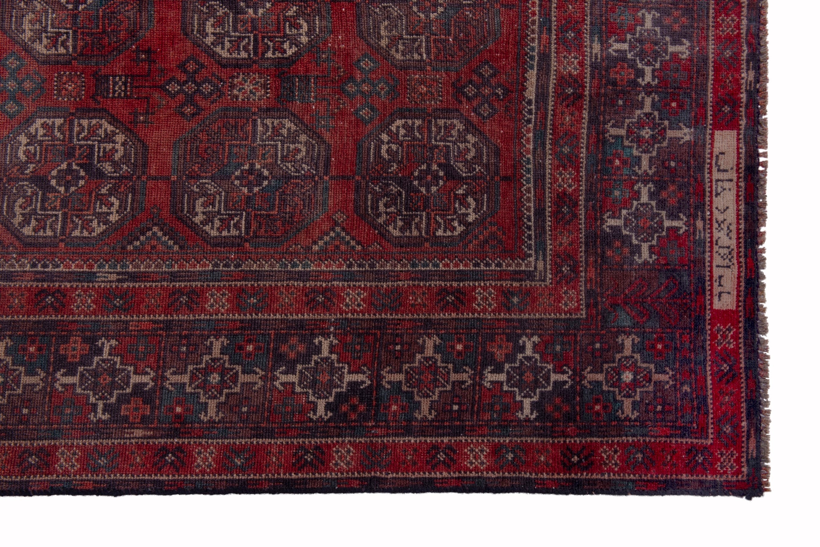 Persian Baluch runner rug in deep red and ochre, view 5 of 17