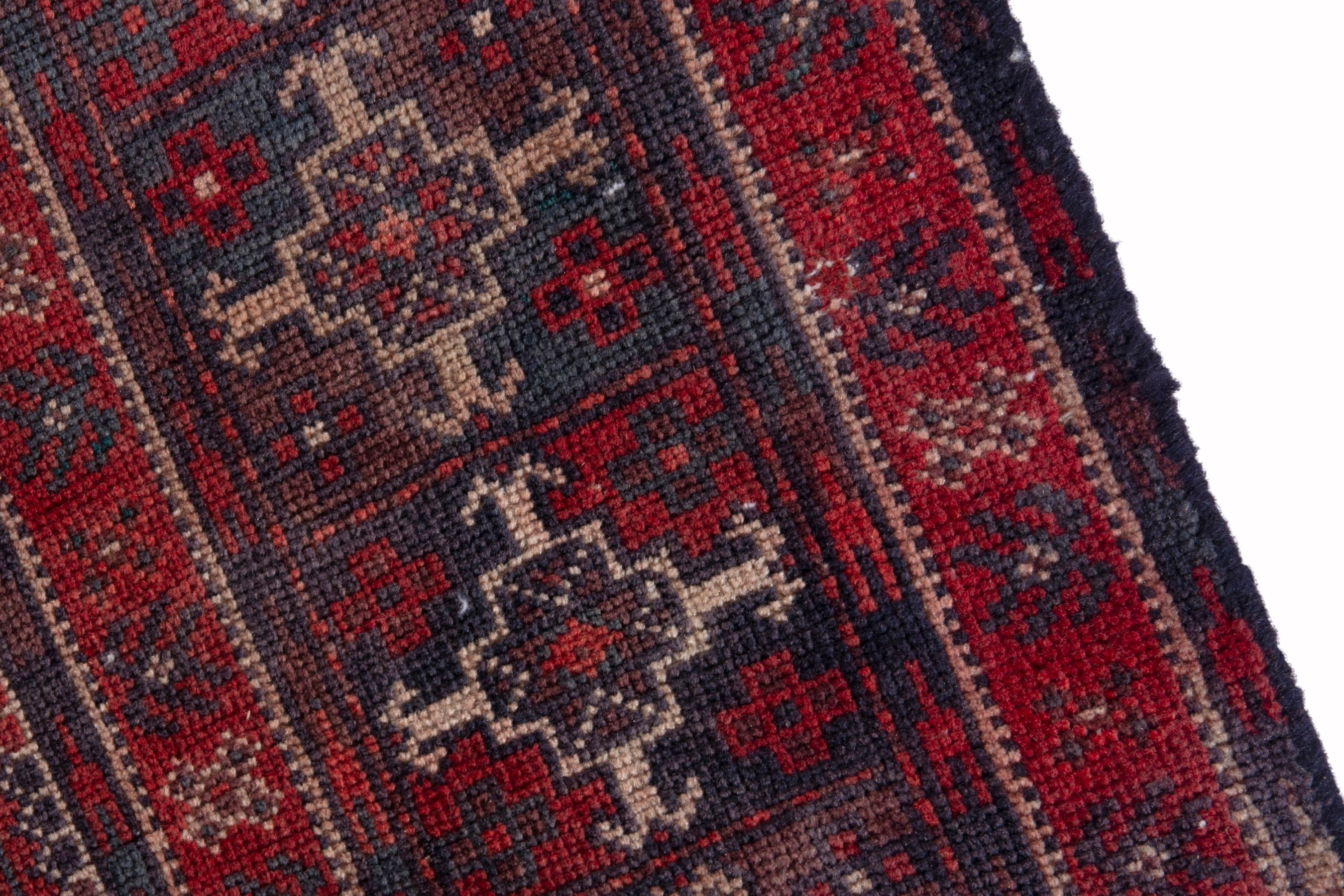 Persian Baluch runner rug in deep red and ochre, view 7 of 17