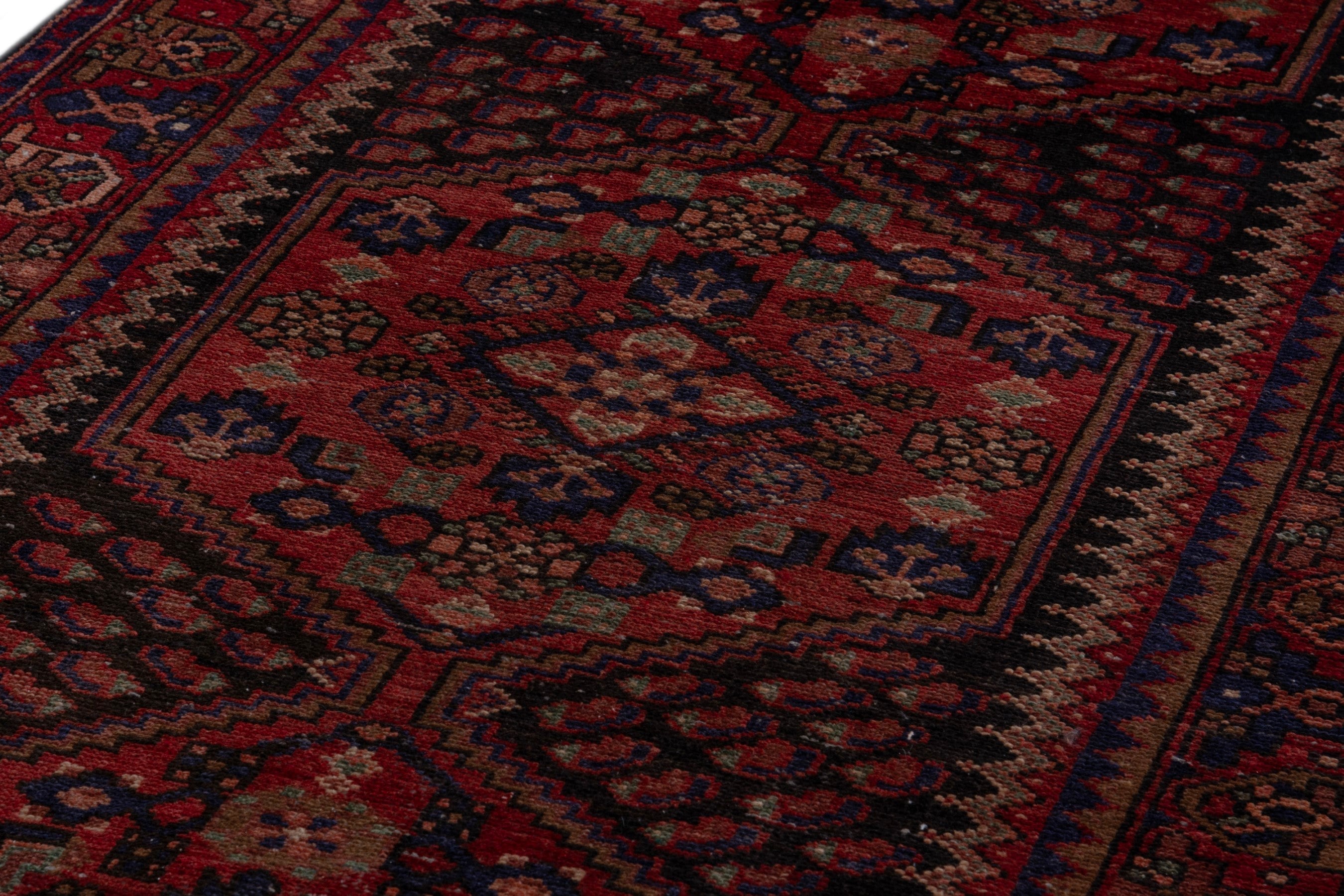 Persian Zanjan runner rug in deep red and burgundy, view 9 of 21