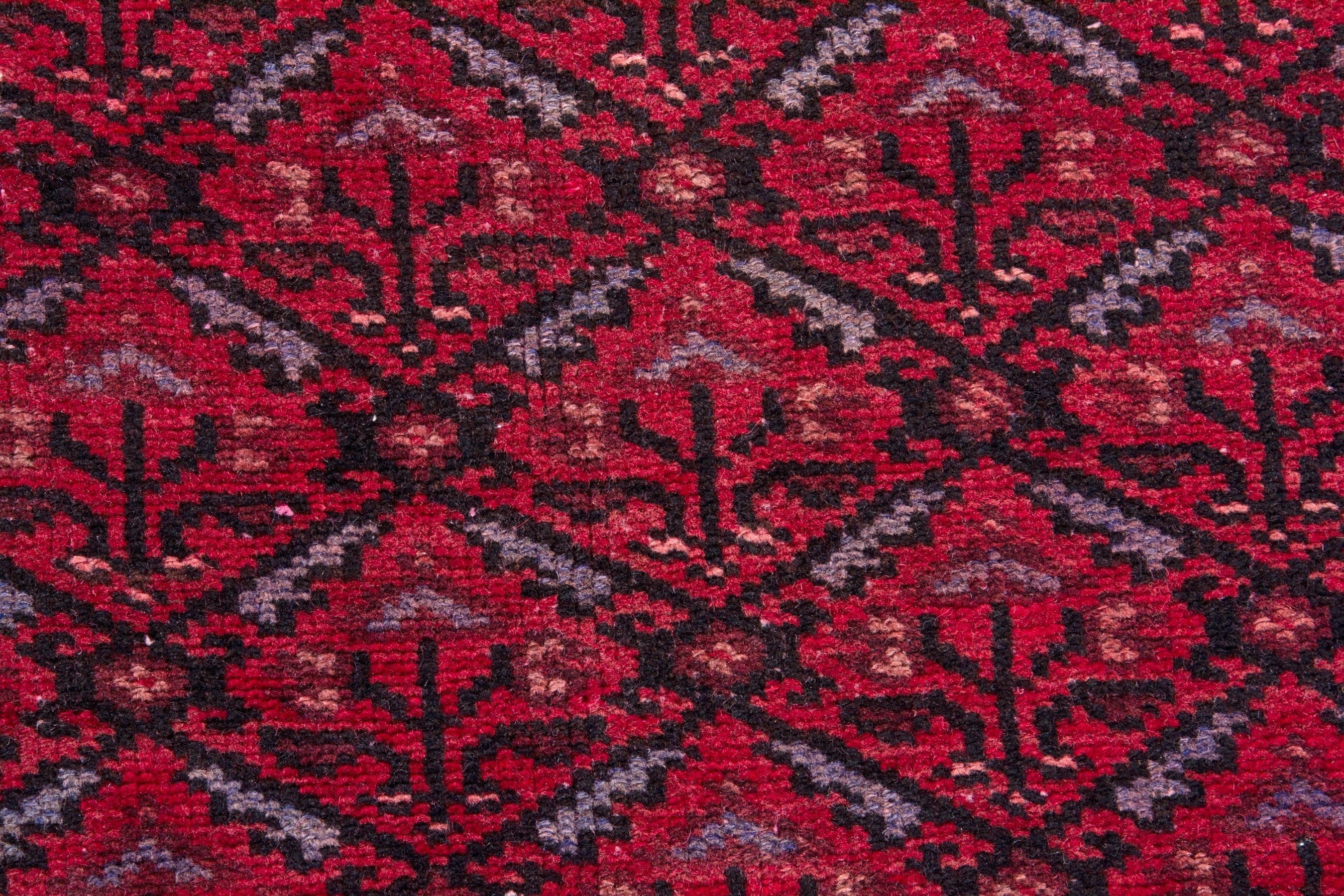 Persian Baluch runner rug in deep red and burgundy, view 10 of 17