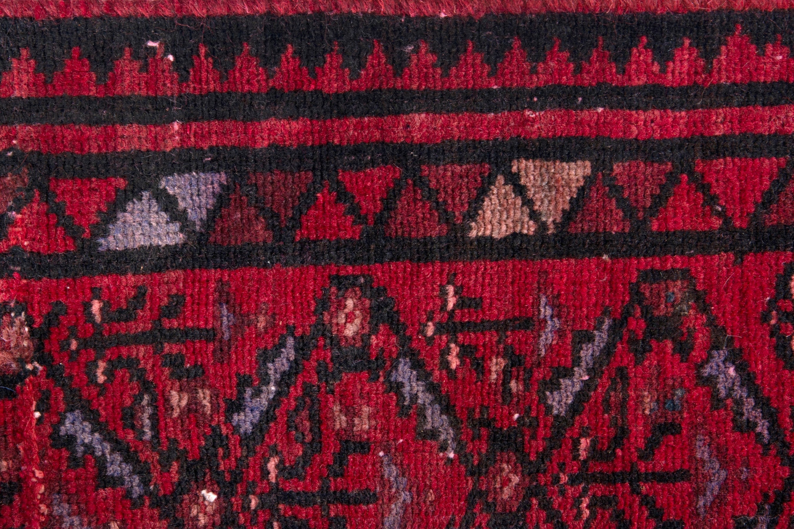 Persian Baluch runner rug in deep red and burgundy, view 11 of 17