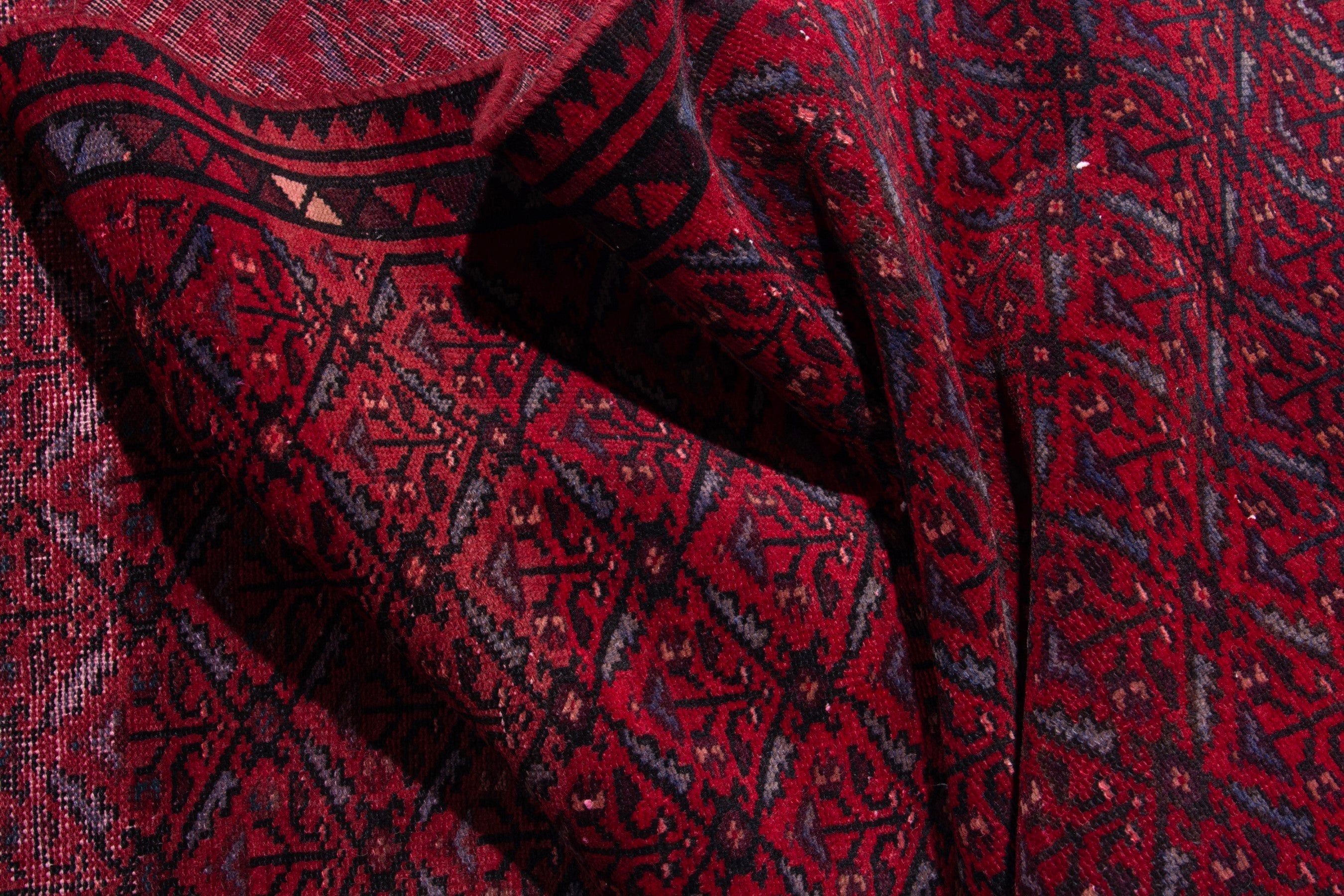 Persian Baluch runner rug in deep red and burgundy, view 12 of 17