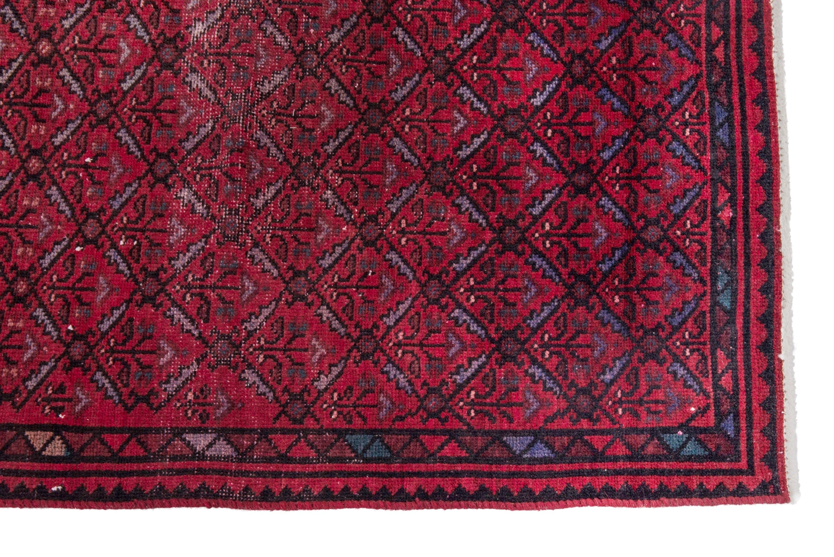 Persian Baluch runner rug in deep red and burgundy, view 5 of 17
