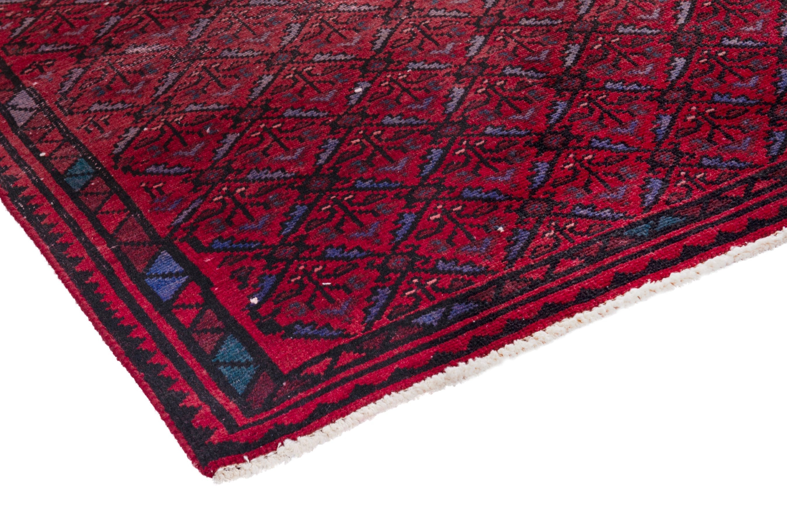 Persian Baluch runner rug in deep red and burgundy, view 4 of 17