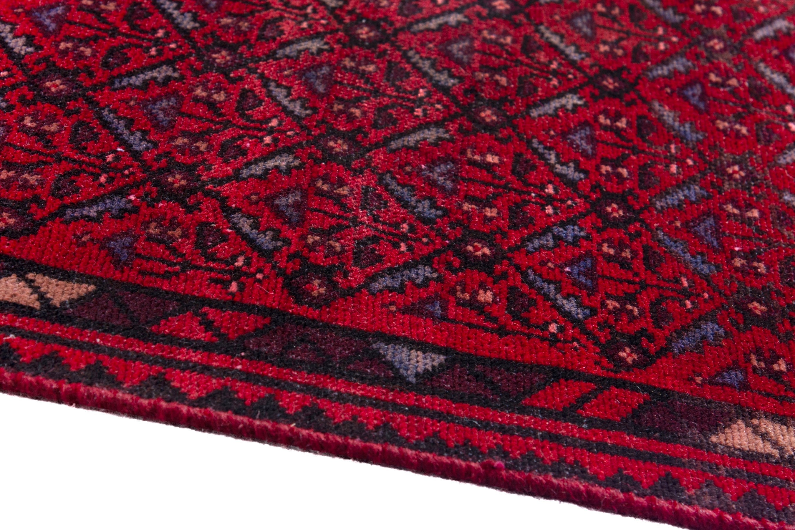 Persian Baluch runner rug in deep red and burgundy, view 8 of 17