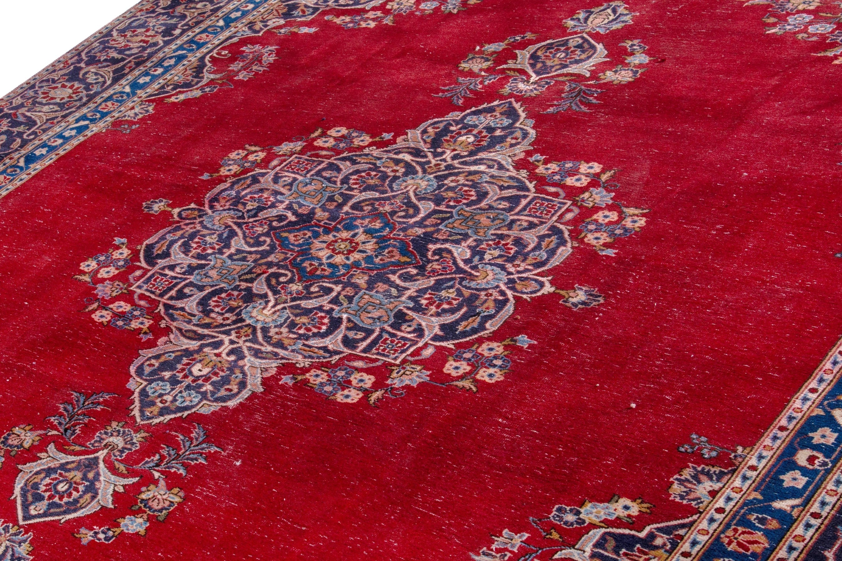 Persian Kashan oversized rug in burgundy and navy, view 9 of 21