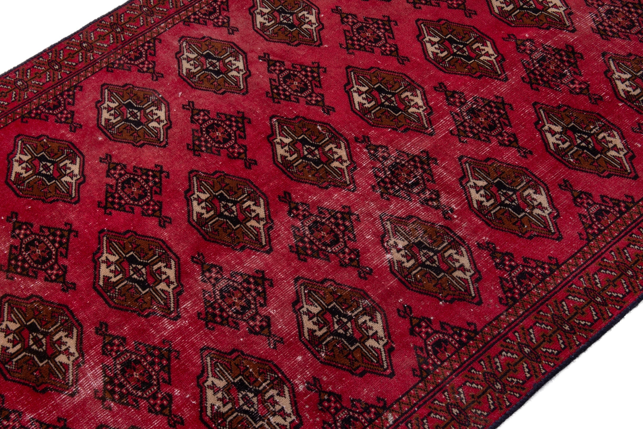 Persian Torkaman accent rug in burgundy and dark brown, view 6 of 18