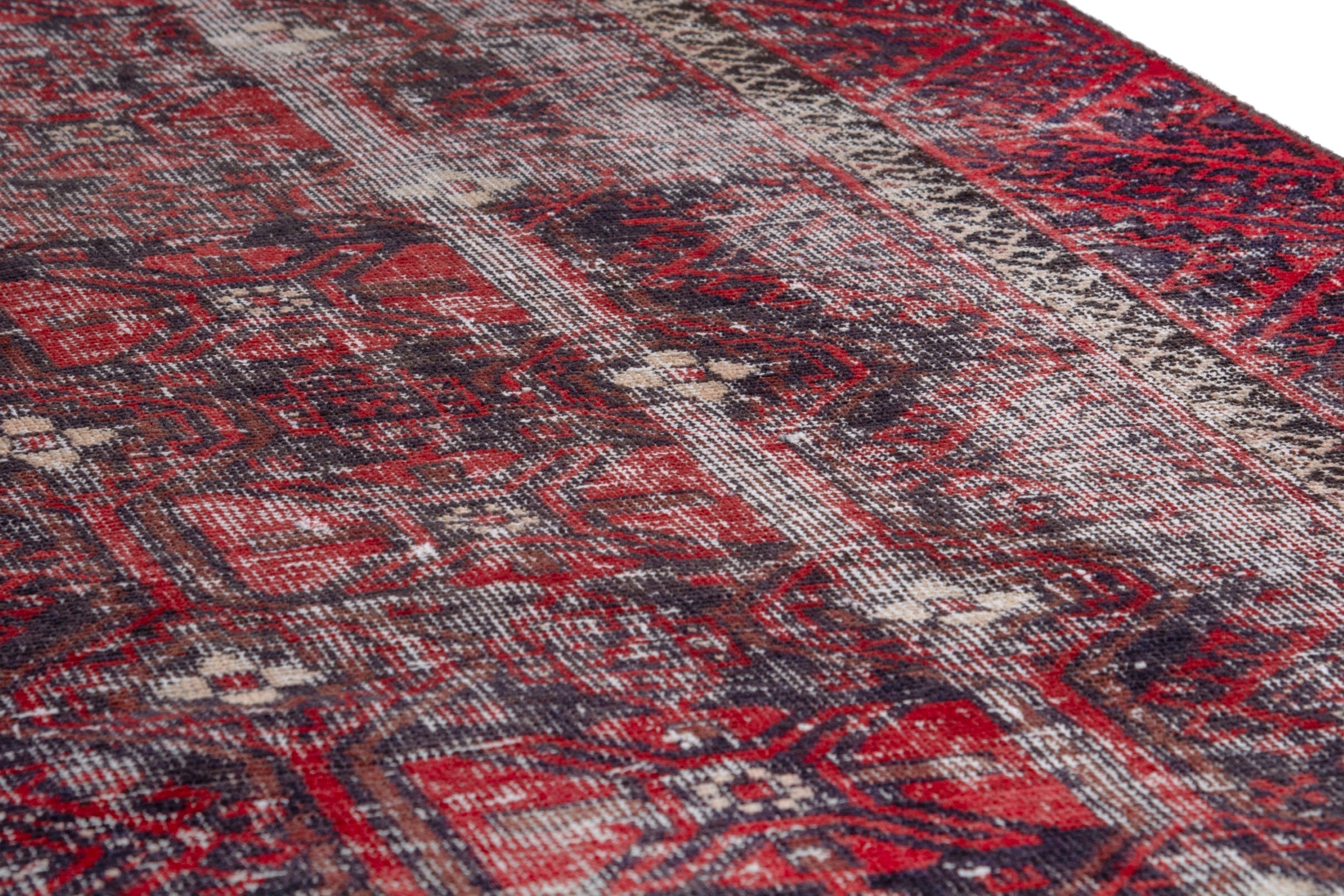 Persian Baluch runner rug in burgundy and faded red, view 10 of 19