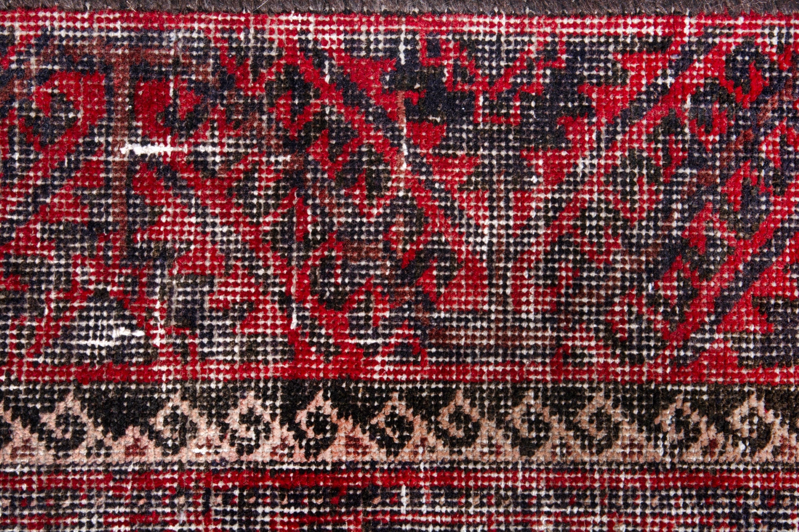 Persian Baluch runner rug in burgundy and faded red, view 11 of 19