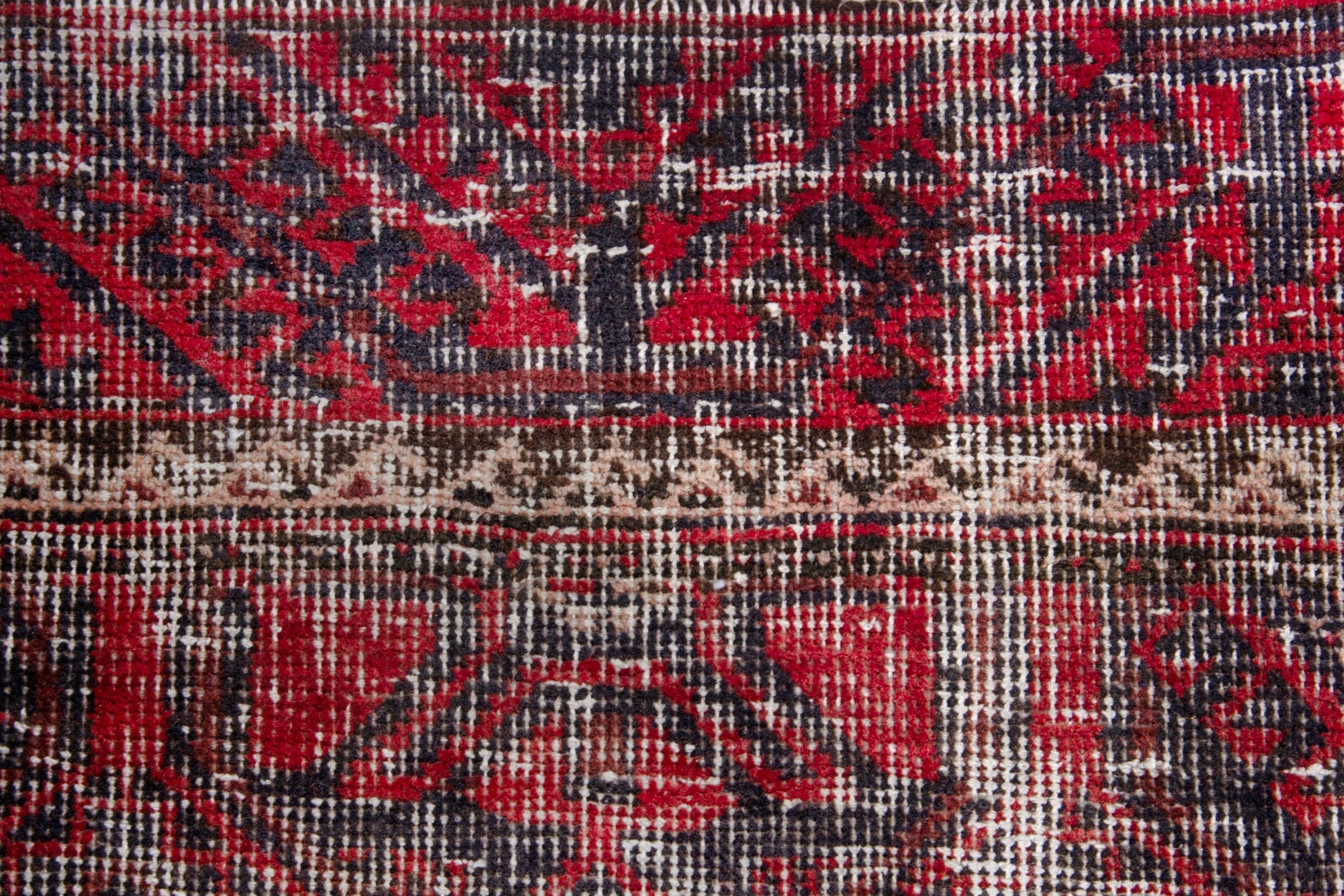 Persian Baluch runner rug in burgundy and faded red, view 13 of 19