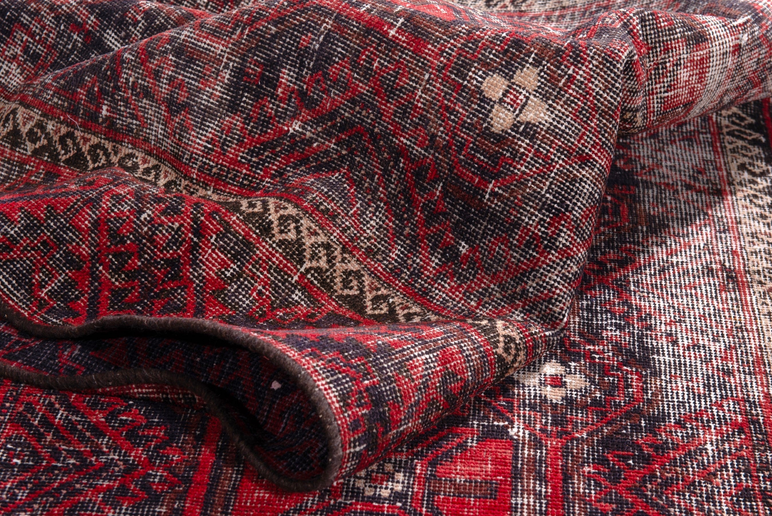 Persian Baluch runner rug in burgundy and faded red, view 18 of 19
