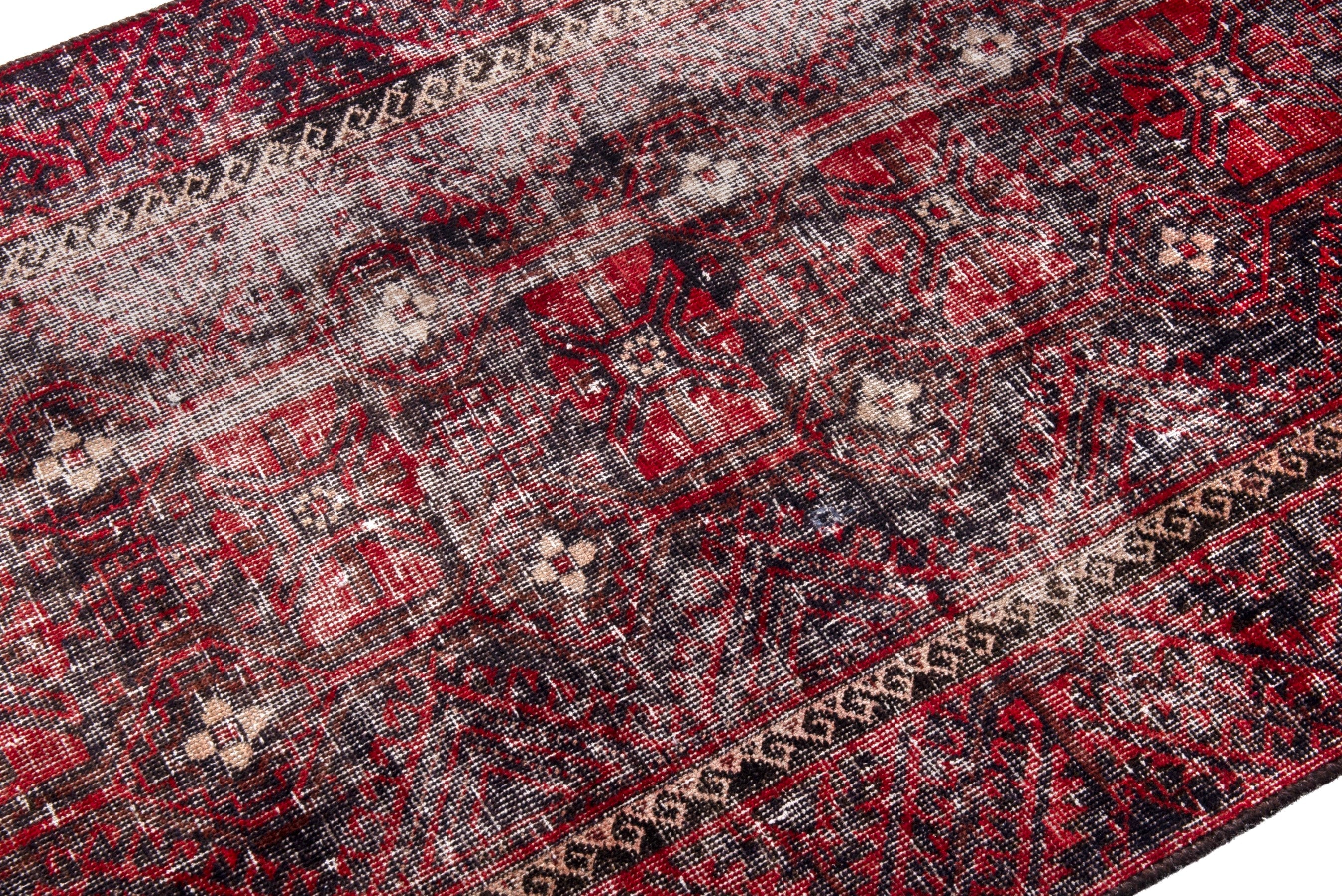 Persian Baluch runner rug in burgundy and faded red, view 6 of 19