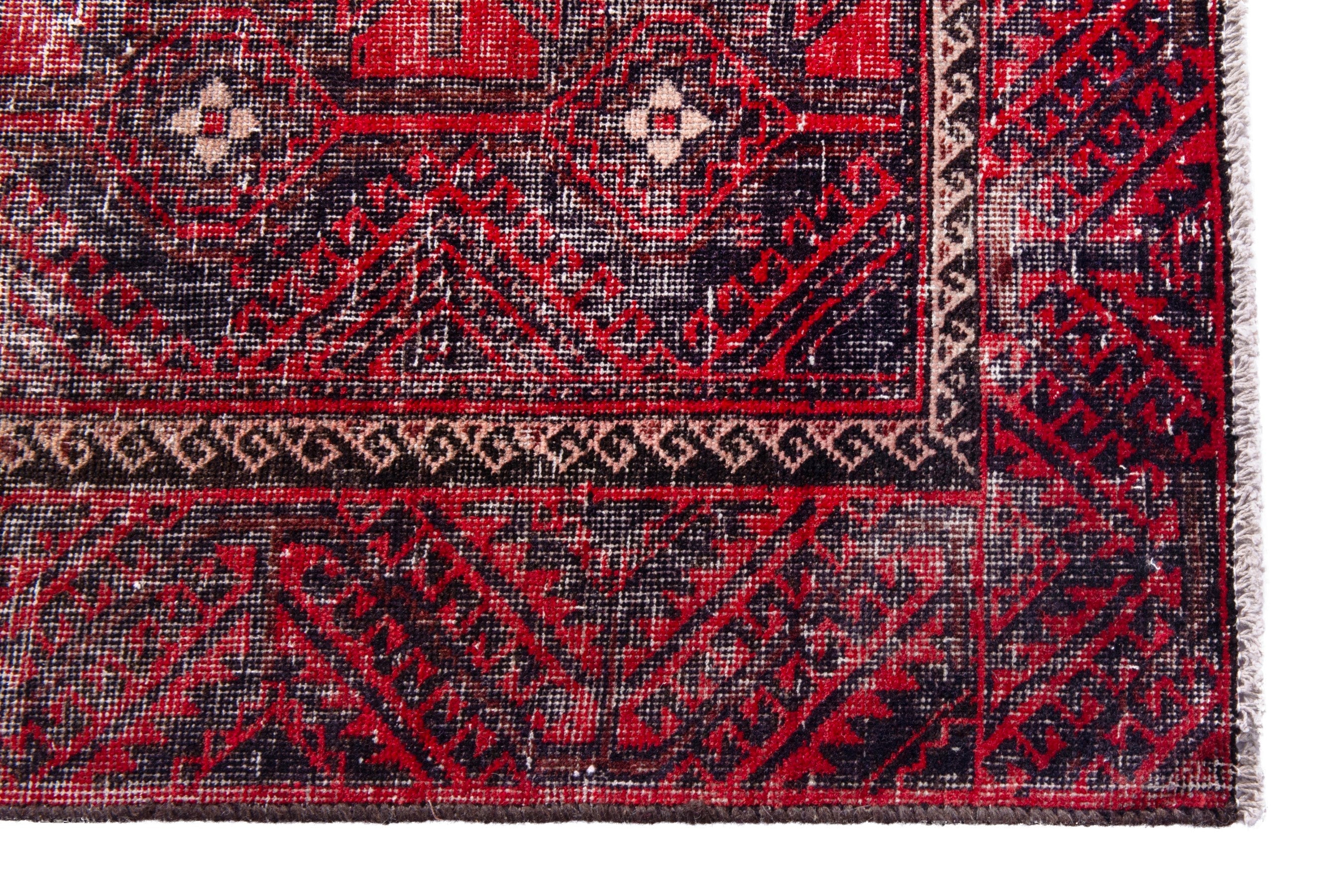 Persian Baluch runner rug in burgundy and faded red, view 5 of 19
