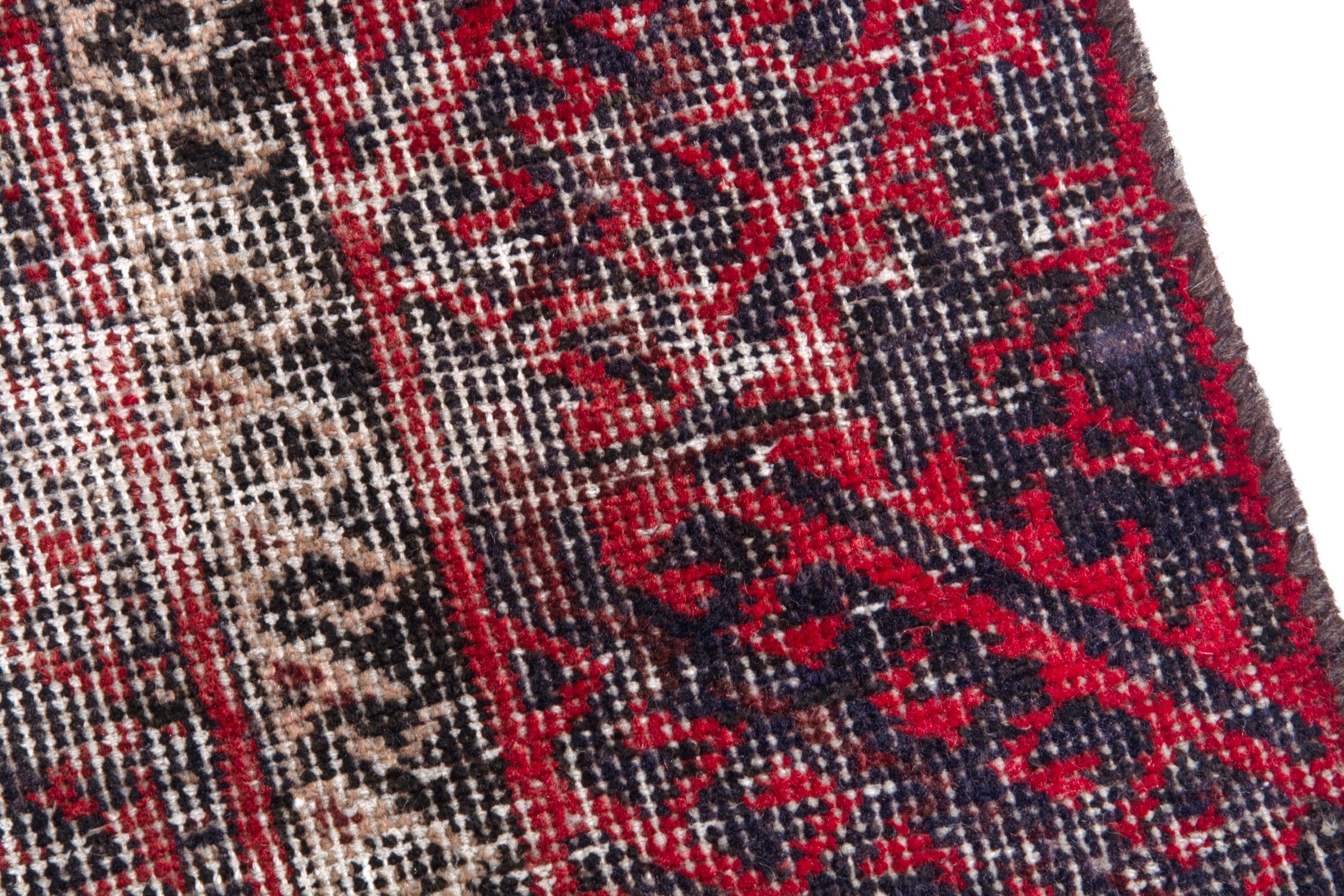 Persian Baluch runner rug in burgundy and faded red, view 7 of 19