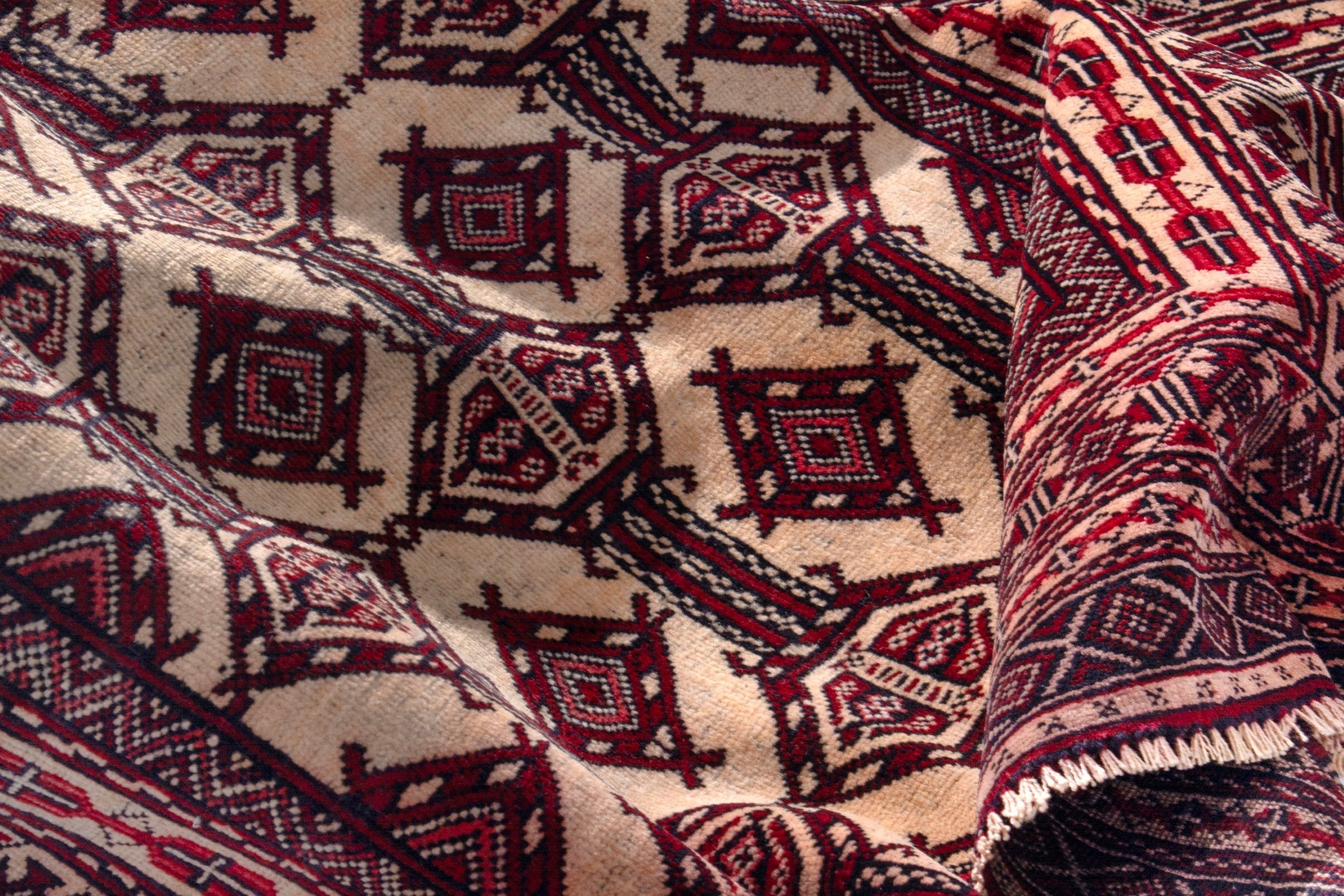 Persian Baluch accent rug in cream and burgundy, view 14 of 19