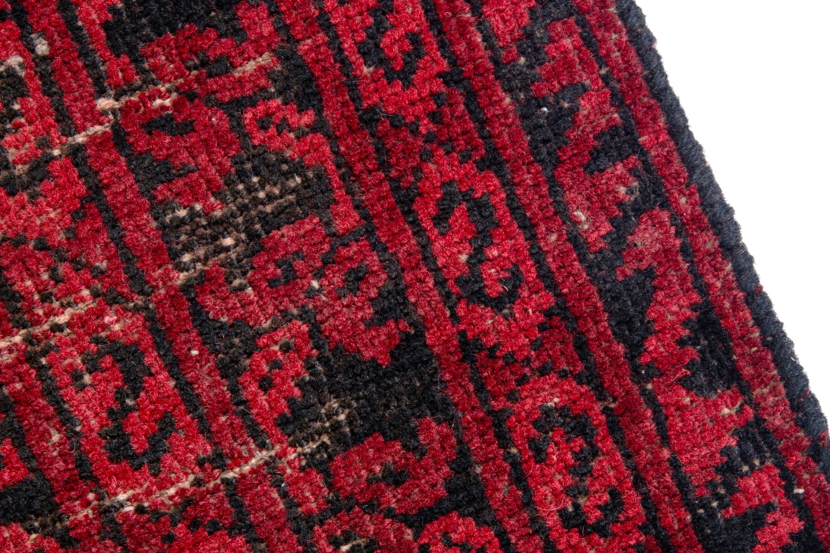 Persian Baluch accent rug in deep red and burgundy, view 7 of 17