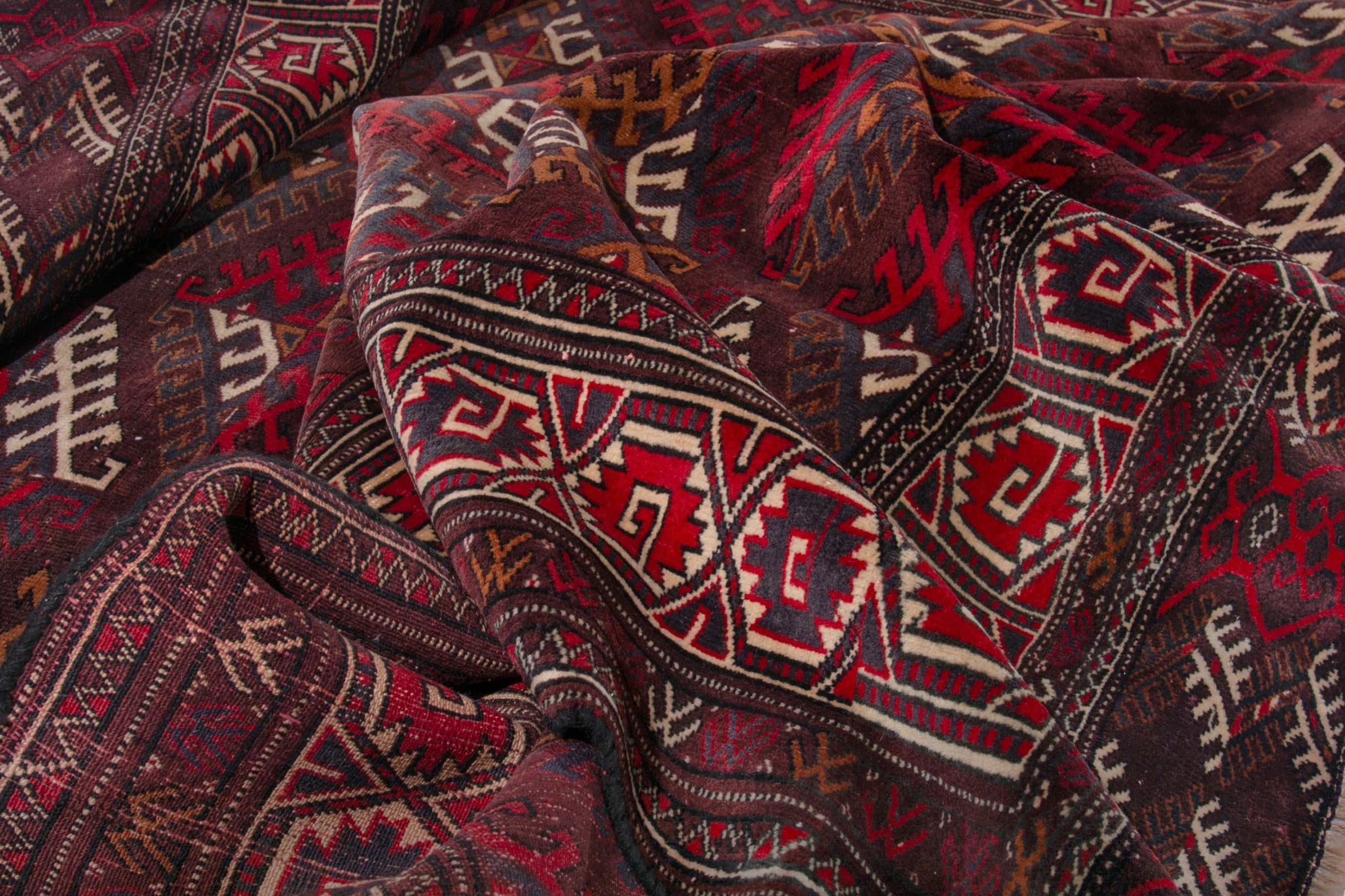 Persian Torkaman oversized rug in burgundy and brick, view 18 of 19