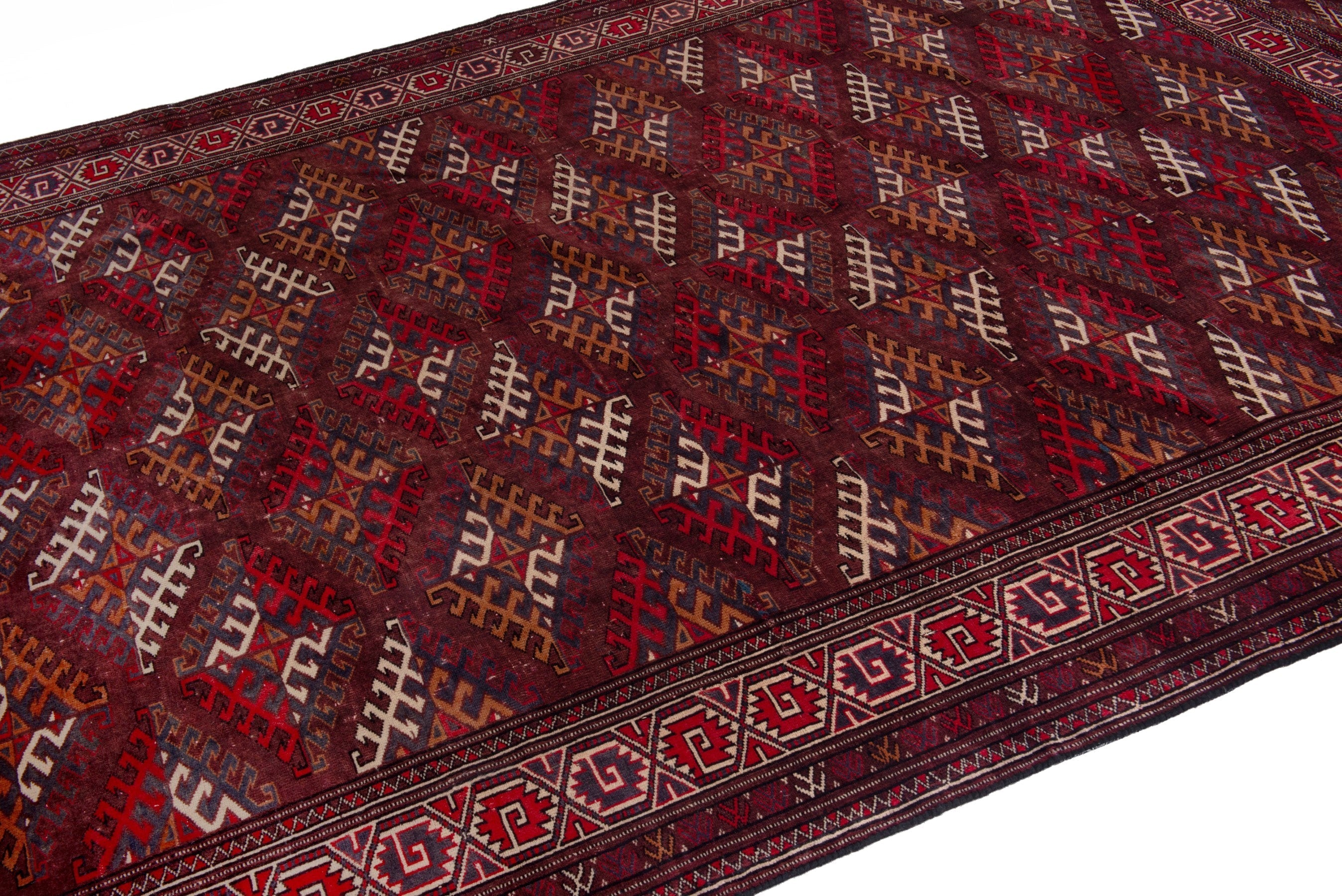 Persian Torkaman oversized rug in burgundy and brick, view 6 of 19