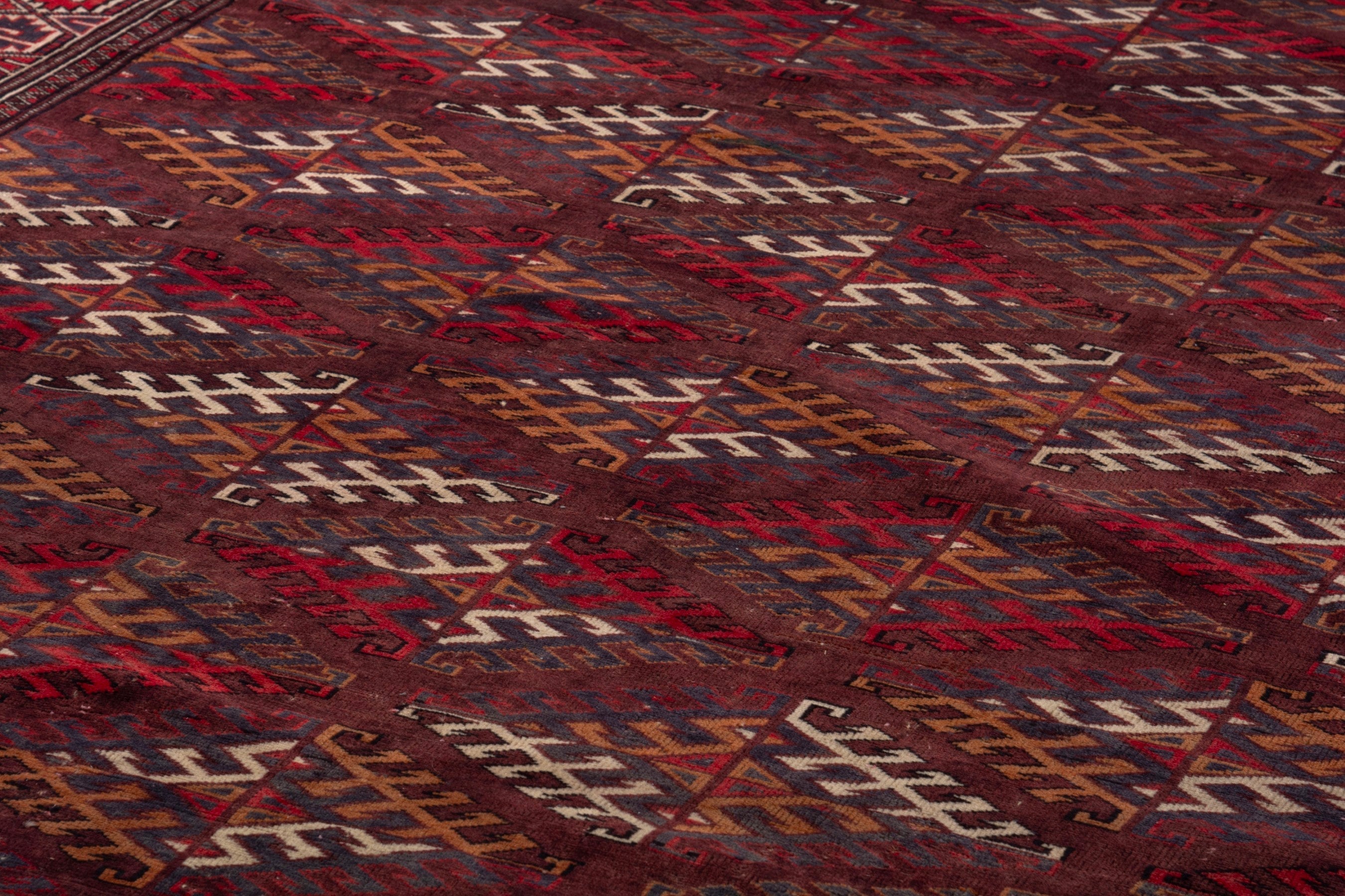 Persian Torkaman oversized rug in burgundy and brick, view 9 of 19