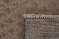 Turkish Anatolian accent rug in tan and brown, view 9 of 17