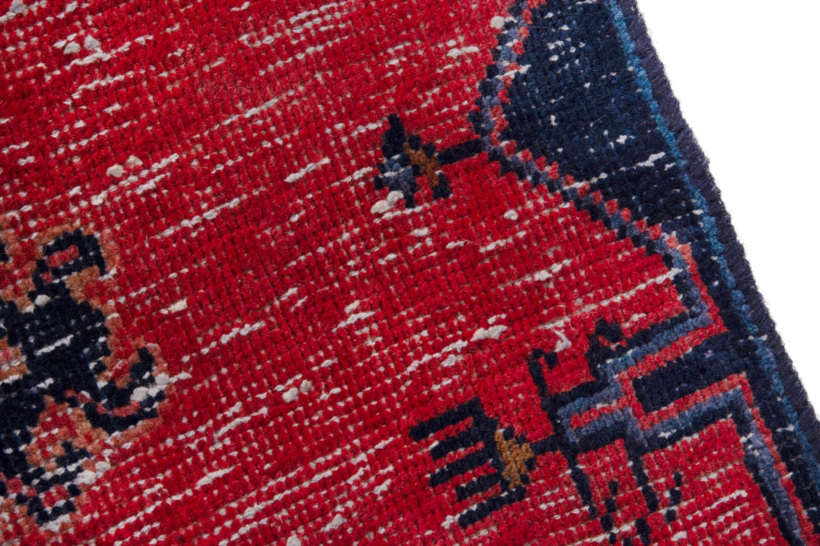 Persian Vist accent rug in deep red and dark blue, view 7 of 17