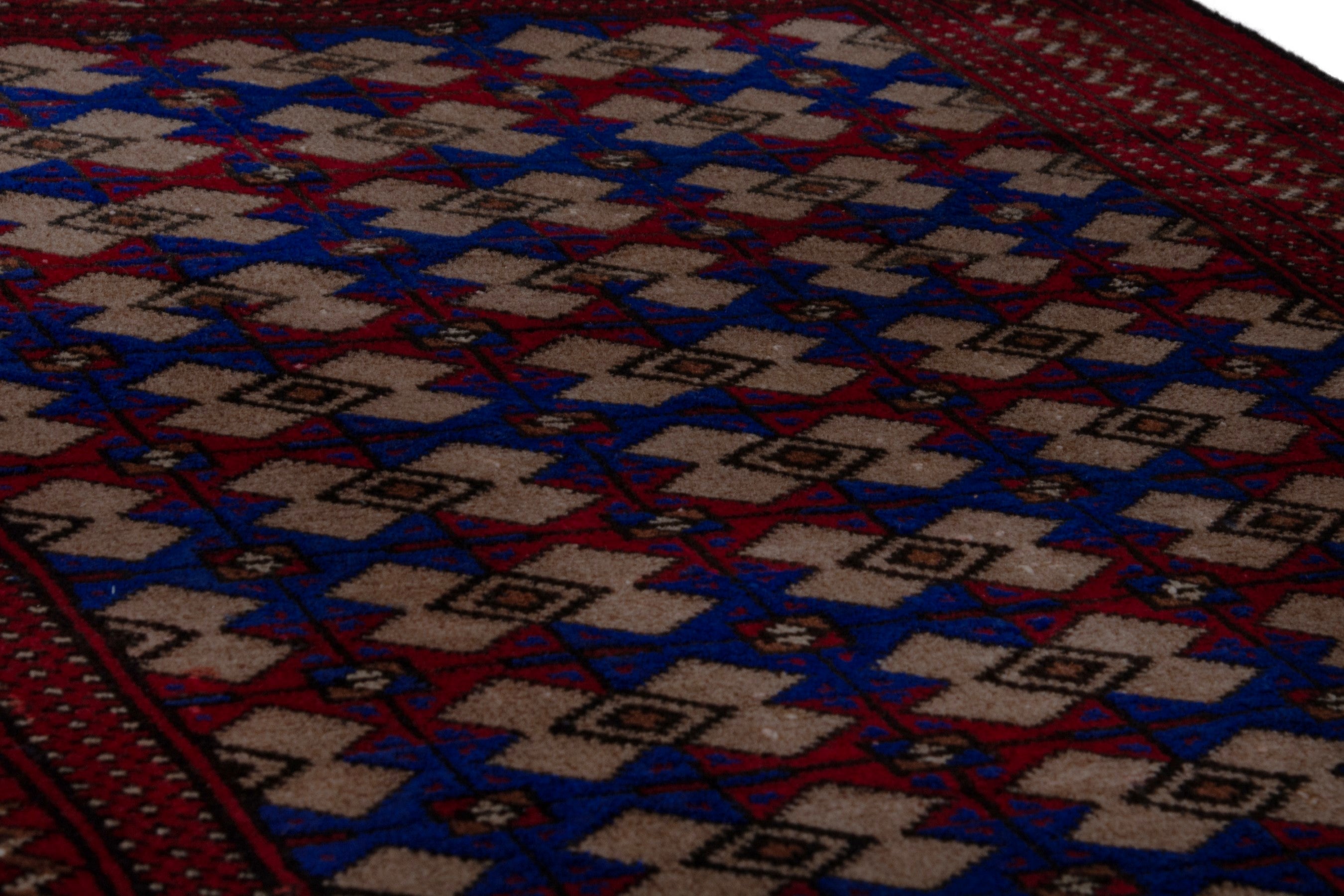 Persian Torkaman accent rug in burgundy and navy, view 10 of 17