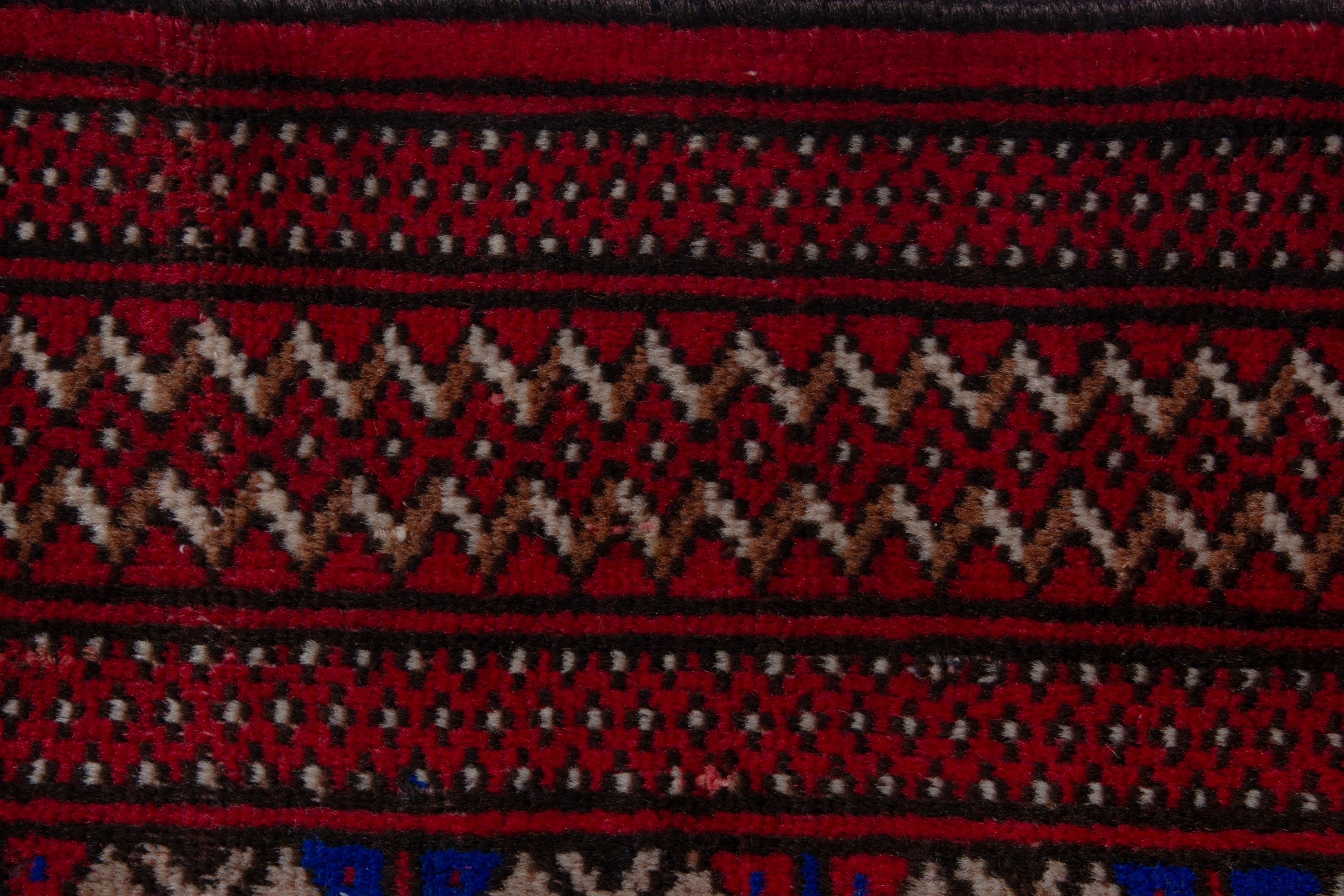 Persian Torkaman accent rug in burgundy and navy, view 12 of 17