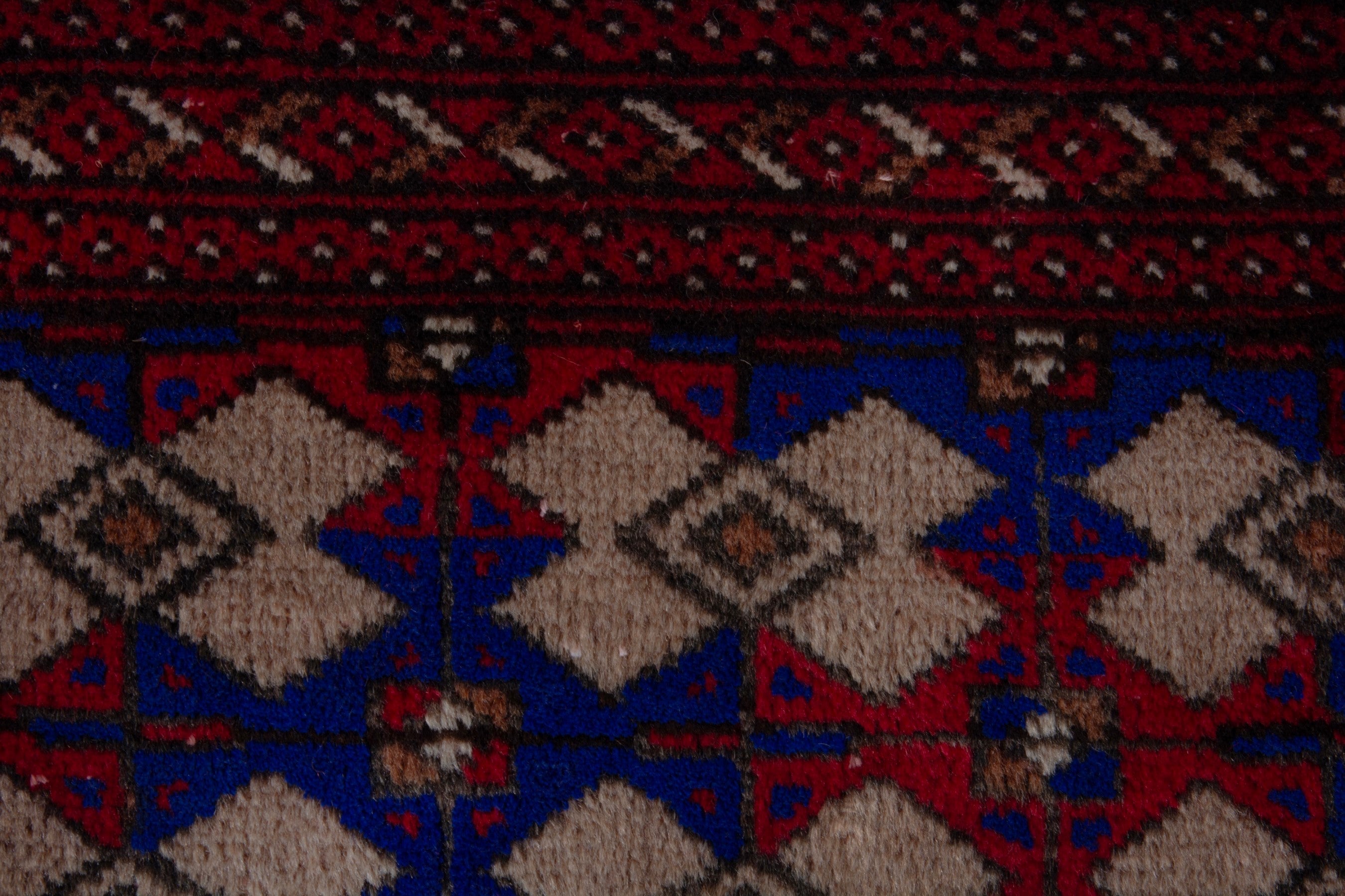 Persian Torkaman accent rug in burgundy and navy, view 13 of 17