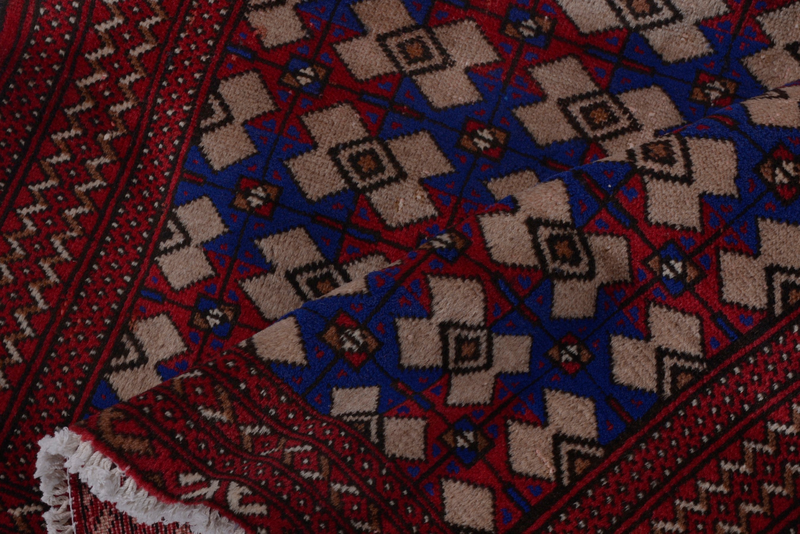 Persian Torkaman accent rug in burgundy and navy, view 14 of 17