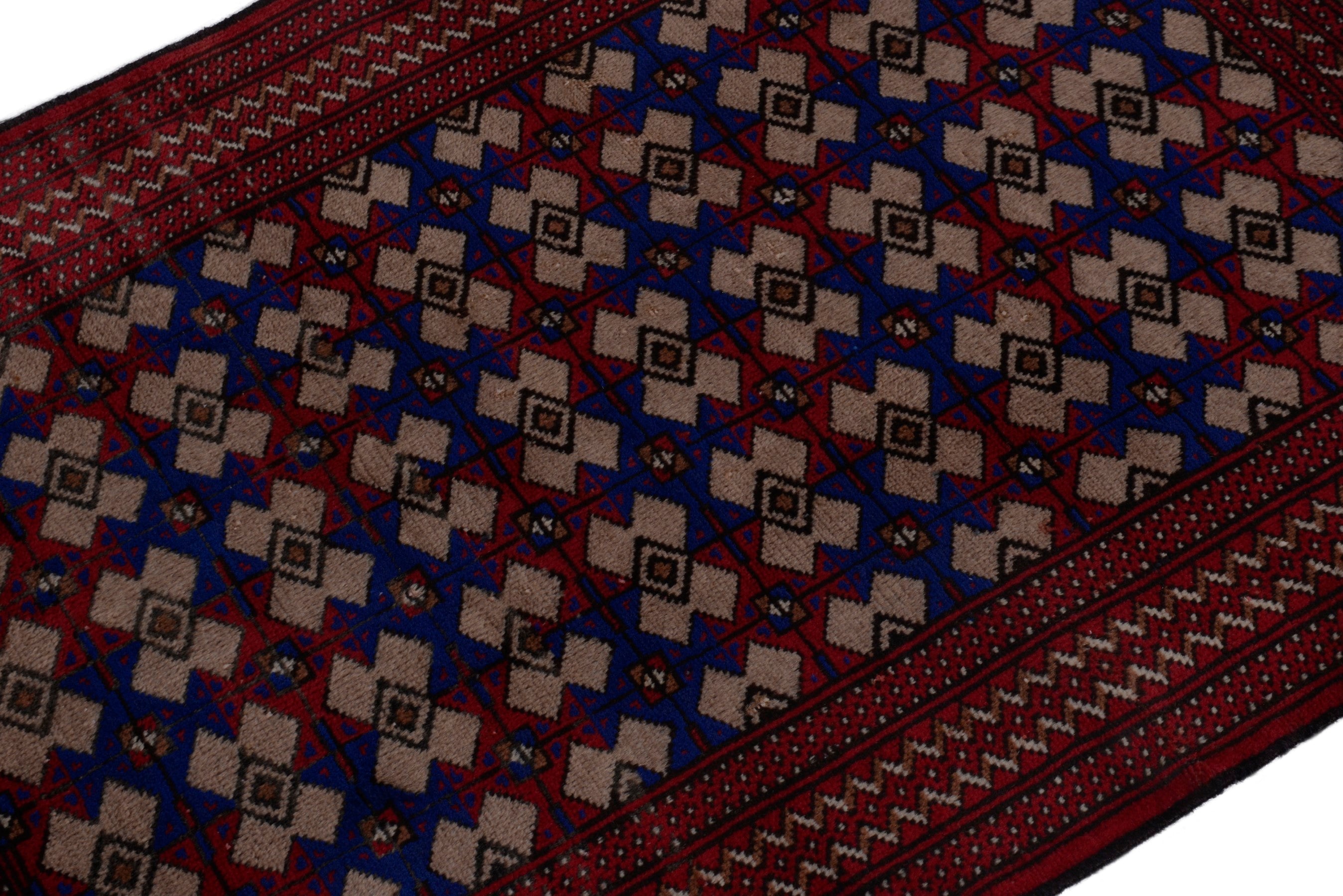 Persian Torkaman accent rug in burgundy and navy, view 6 of 17