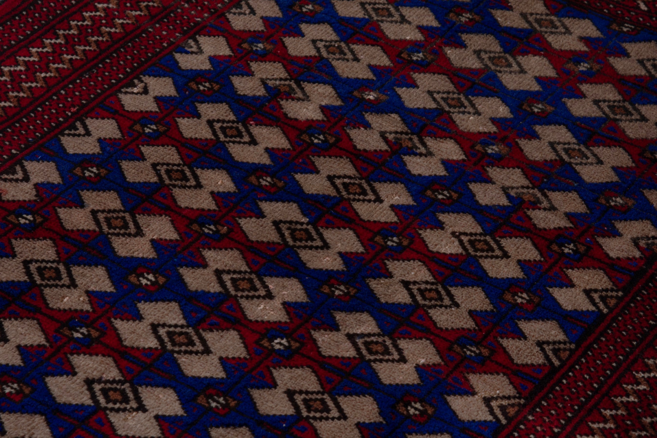 Persian Torkaman accent rug in burgundy and navy, view 9 of 17