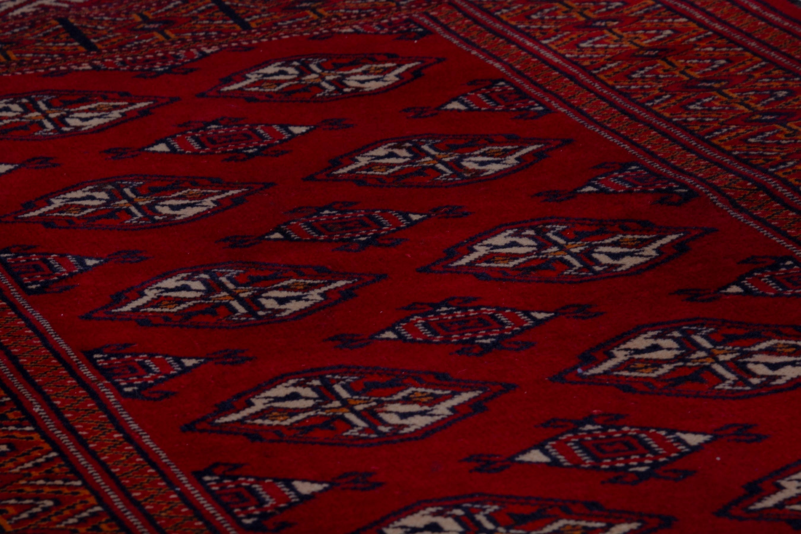 Persian Torkaman accent rug in deep red and burgundy, view 10 of 18