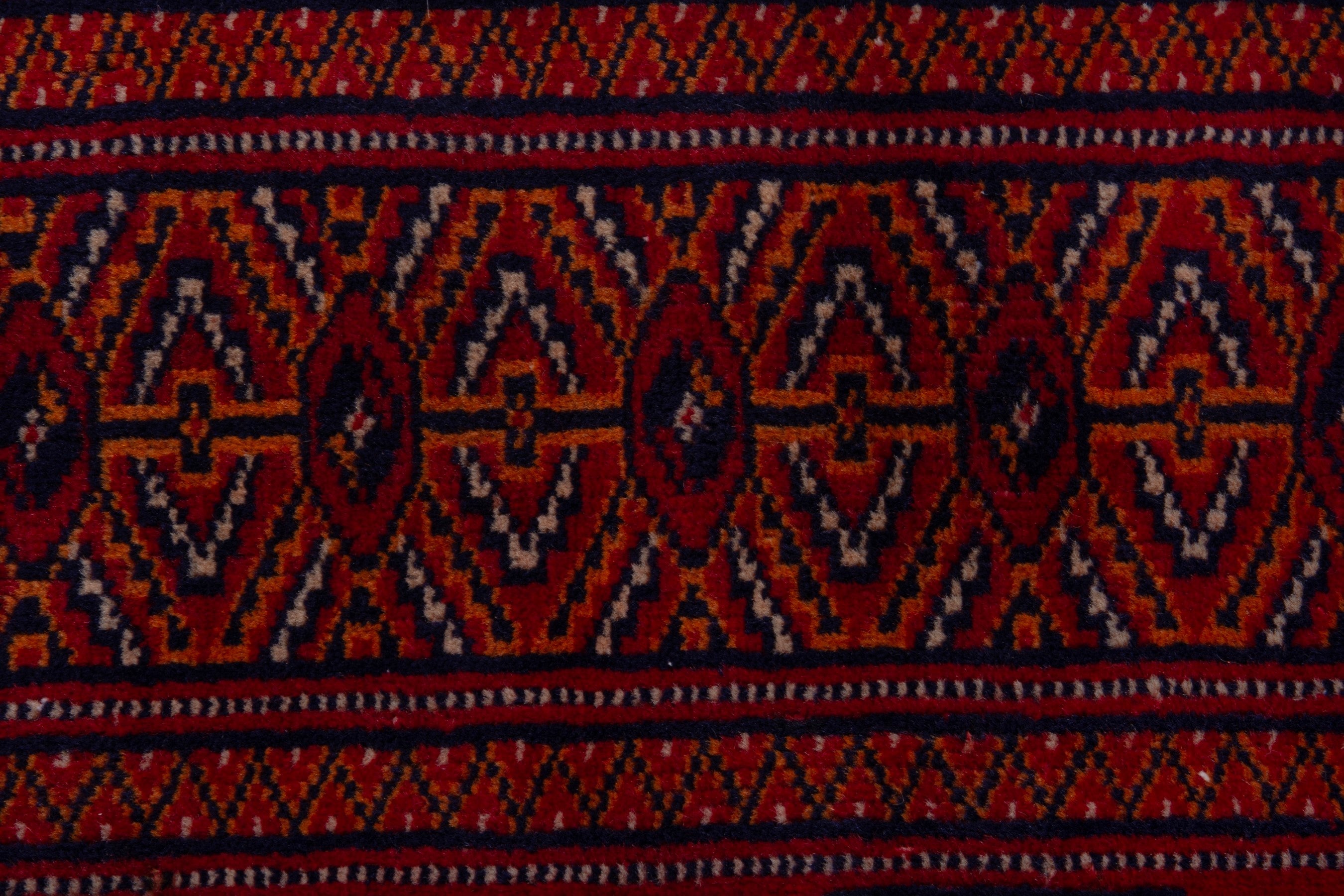 Persian Torkaman accent rug in deep red and burgundy, view 11 of 18