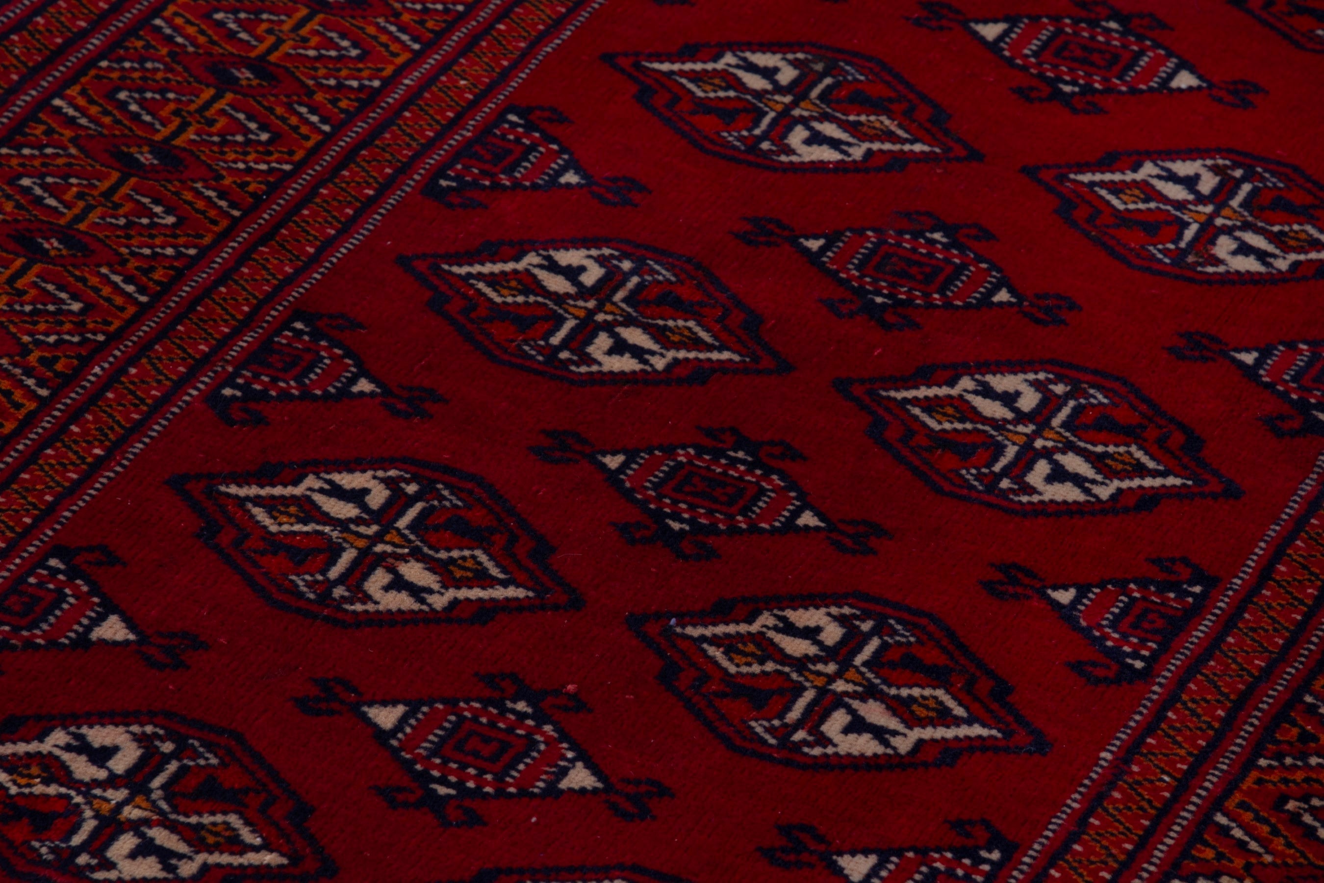 Persian Torkaman accent rug in deep red and burgundy, view 9 of 18