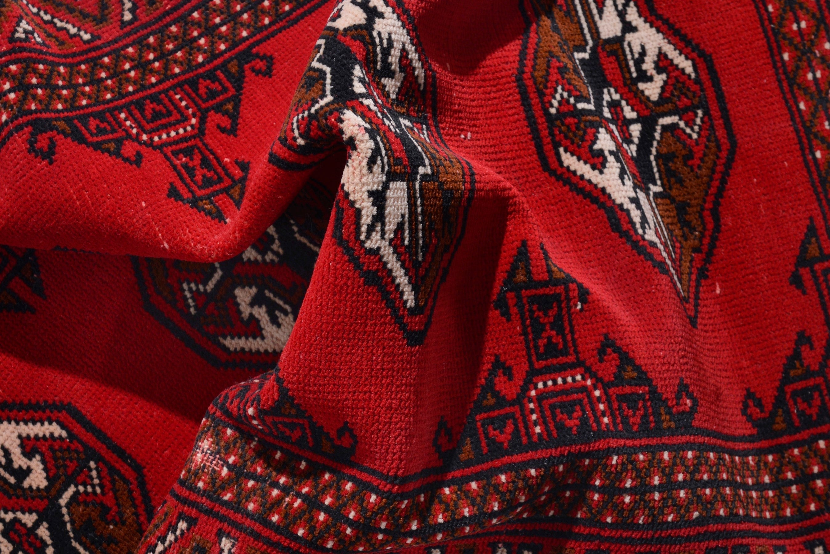 Persian Torkaman accent rug in deep red and burgundy, view 16 of 17