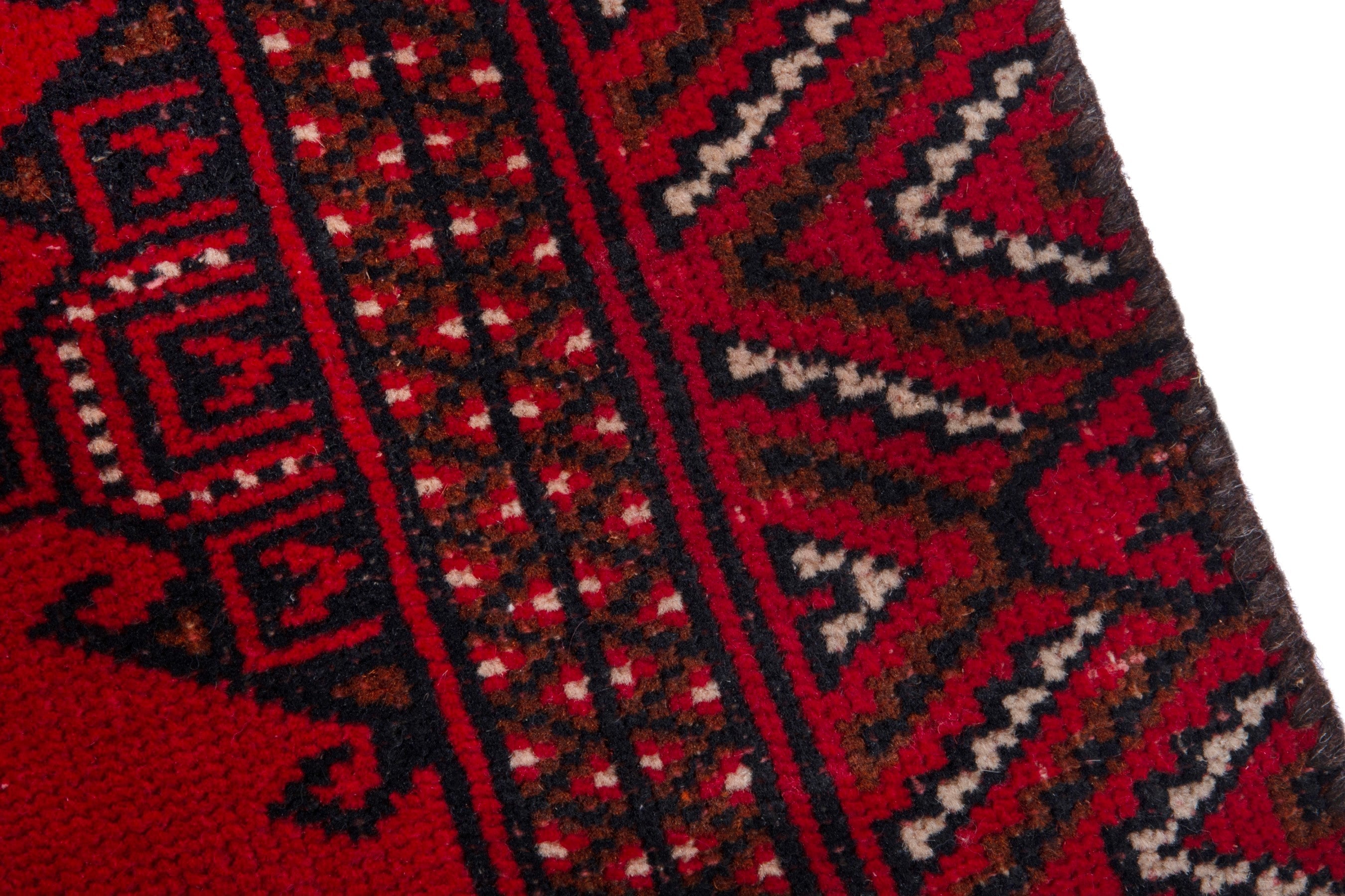 Persian Torkaman accent rug in deep red and burgundy, view 7 of 17